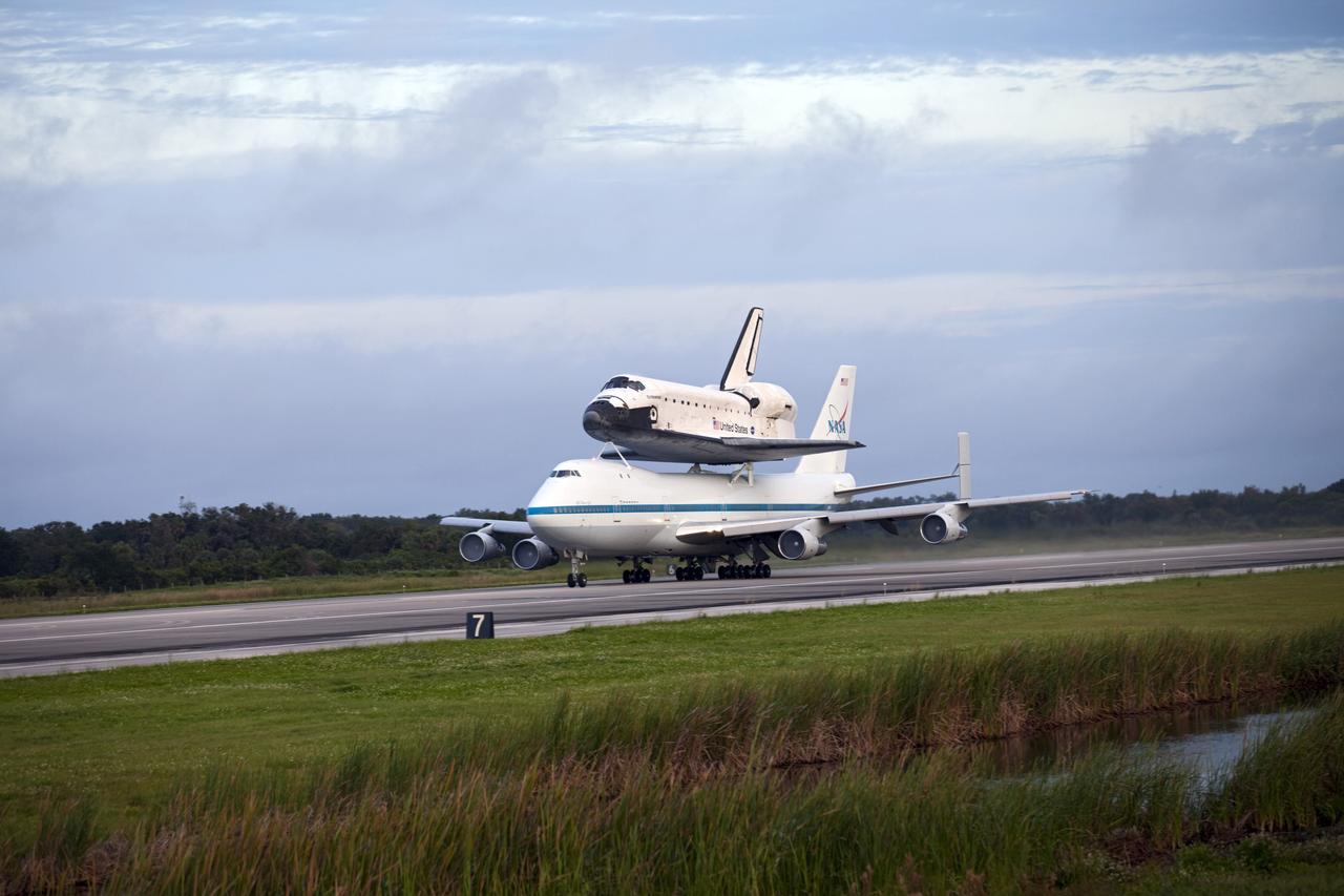 CAPE CANAVERAL, Fla. – At the Shuttle Landing Facility at NASA's Kennedy Space Center in Florida, NASA's Shuttle Carrier Aircraft, or SCA, with the space shuttle Endeavour mounted atop, prepares to take off for its ferry flight to California. The SCA, a modified 747 jetliner, will fly Endeavour to Los Angeles where it will be placed on public display at the California Science Center. This is the final ferry flight scheduled in the Space Shuttle Program era. For more information on the shuttles' transition and retirement, visit http://www.nasa.gov/transition. Photo credit: NASA/Frankie Martin