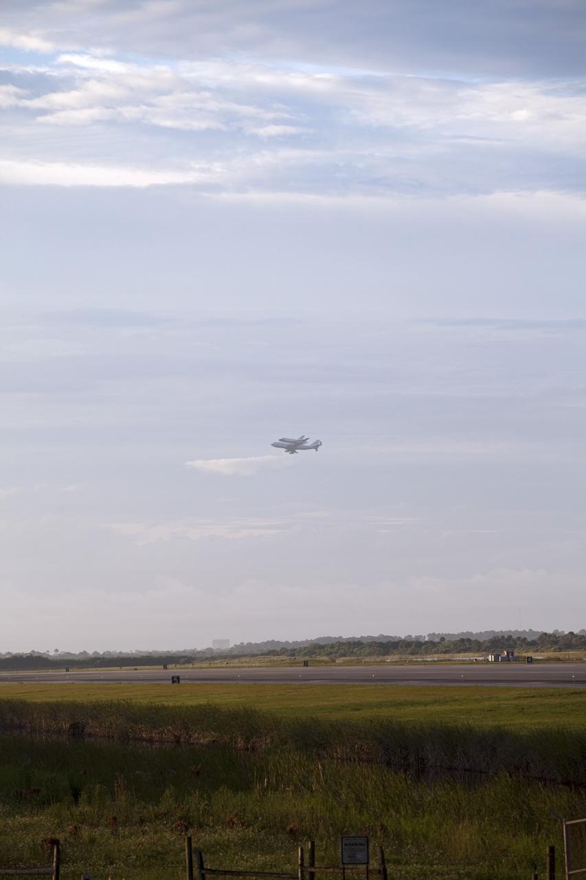 CAPE CANAVERAL, Fla. – At the Shuttle Landing Facility at NASA's Kennedy Space Center in Florida, NASA's Shuttle Carrier Aircraft, or SCA, with the space shuttle Endeavour mounted atop, takes off for its ferry flight to California. The SCA, a modified 747 jetliner, will fly Endeavour to Los Angeles where it will be placed on public display at the California Science Center. This is the final ferry flight scheduled in the Space Shuttle Program era. For more information on the shuttles' transition and retirement, visit http://www.nasa.gov/transition. Photo credit: NASA/Frankie Martin