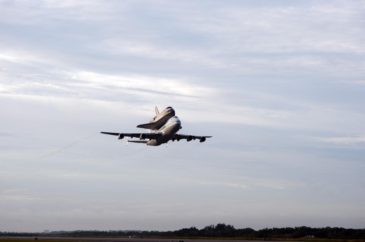 CAPE CANAVERAL, Fla. – Space shuttle Endeavour, mounted atop NASA's Shuttle Carrier Aircraft or SCA, takes off from the Shuttle Landing Facility at NASA's Kennedy Space Center in Florida. The SCA, a modified 747 jetliner, will fly Endeavour to Los Angeles where it will be placed on public display at the California Science Center. This is the final ferry flight scheduled in the Space Shuttle Program era. For more information on the shuttles' transition and retirement, visit http://www.nasa.gov/transition. Photo credit: NASA/Rusty Backer