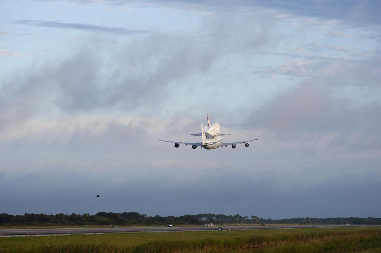 CAPE CANAVERAL, Fla. – Space shuttle Endeavour, mounted atop NASA's Shuttle Carrier Aircraft or SCA, takes off from the Shuttle Landing Facility at NASA's Kennedy Space Center in Florida. The SCA, a modified 747 jetliner, will fly Endeavour to Los Angeles where it will be placed on public display at the California Science Center. This is the final ferry flight scheduled in the Space Shuttle Program era. For more information on the shuttles' transition and retirement, visit http://www.nasa.gov/transition. Photo credit: NASA/Rusty Backer