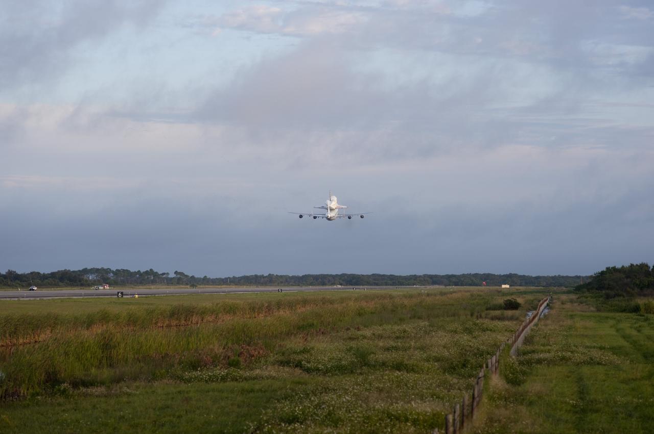 CAPE CANAVERAL, Fla. – Space shuttle Endeavour, mounted atop NASA's Shuttle Carrier Aircraft or SCA, takes off from the Shuttle Landing Facility at NASA's Kennedy Space Center in Florida. The SCA, a modified 747 jetliner, will fly Endeavour to Los Angeles where it will be placed on public display at the California Science Center. This is the final ferry flight scheduled in the Space Shuttle Program era. For more information on the shuttles' transition and retirement, visit http://www.nasa.gov/transition. Photo credit: NASA/Rusty Backer