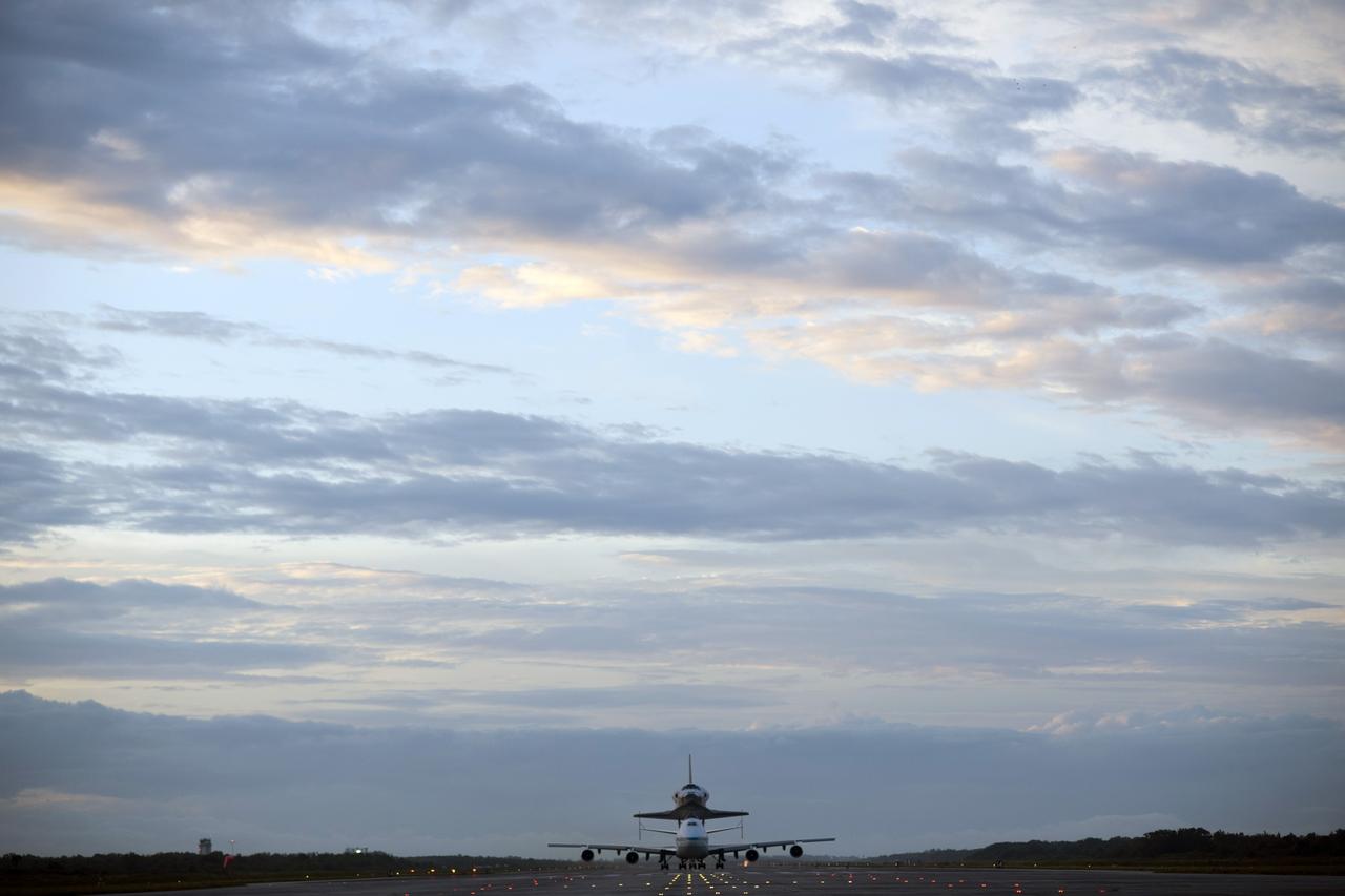 CAPE CANAVERAL, Fla. – Space shuttle Endeavour, mounted atop NASA's Shuttle Carrier Aircraft or SCA, takes off from the Shuttle Landing Facility at NASA's Kennedy Space Center in Florida. The SCA, a modified 747 jetliner, will fly Endeavour to Los Angeles where it will be placed on public display at the California Science Center. This is the final ferry flight scheduled in the Space Shuttle Program era. For more information on the shuttles' transition and retirement, visit http://www.nasa.gov/transition. Photo credit: NASA/Tony Gray and Robert Murray