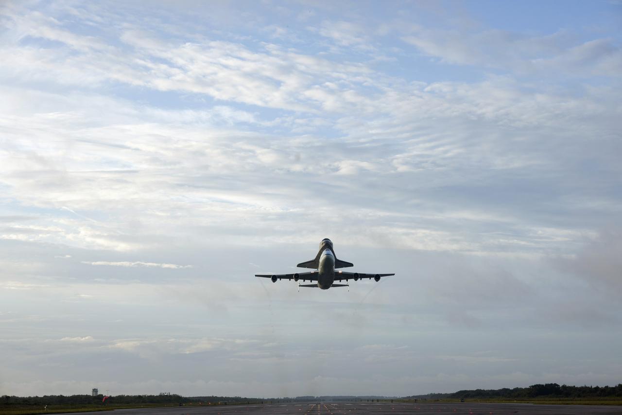 CAPE CANAVERAL, Fla. – Space shuttle Endeavour, mounted atop NASA's Shuttle Carrier Aircraft or SCA, takes off from the Shuttle Landing Facility at NASA's Kennedy Space Center in Florida. The SCA, a modified 747 jetliner, will fly Endeavour to Los Angeles where it will be placed on public display at the California Science Center. This is the final ferry flight scheduled in the Space Shuttle Program era. For more information on the shuttles' transition and retirement, visit http://www.nasa.gov/transition. Photo credit: NASA/Tony Gray and Robert Murray