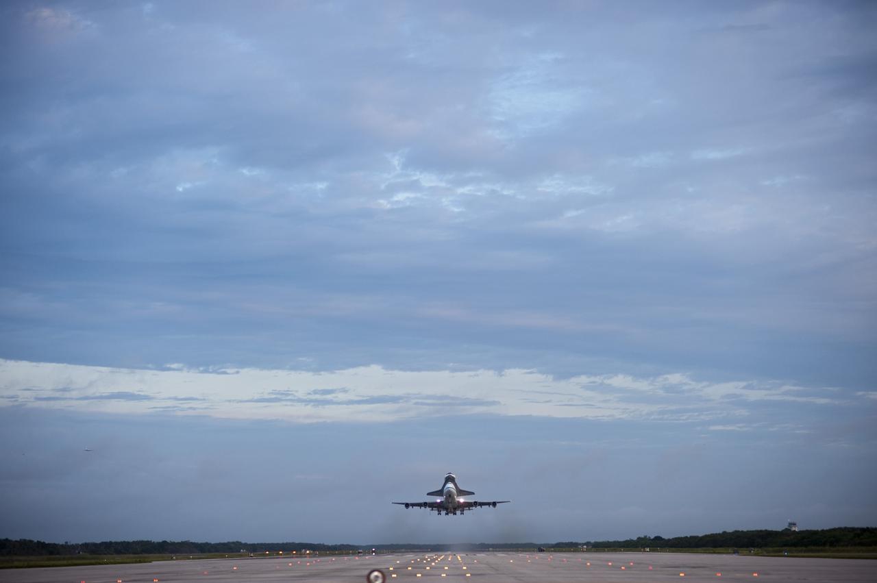 CAPE CANAVERAL, Fla. – Space shuttle Endeavour, mounted atop NASA's Shuttle Carrier Aircraft or SCA, takes off from the Shuttle Landing Facility at NASA's Kennedy Space Center in Florida. The SCA, a modified 747 jetliner, will fly Endeavour to Los Angeles where it will be placed on public display at the California Science Center. This is the final ferry flight scheduled in the Space Shuttle Program era. For more information on the shuttles' transition and retirement, visit http://www.nasa.gov/transition. Photo credit: NASA/Tony Gray and Robert Murray
