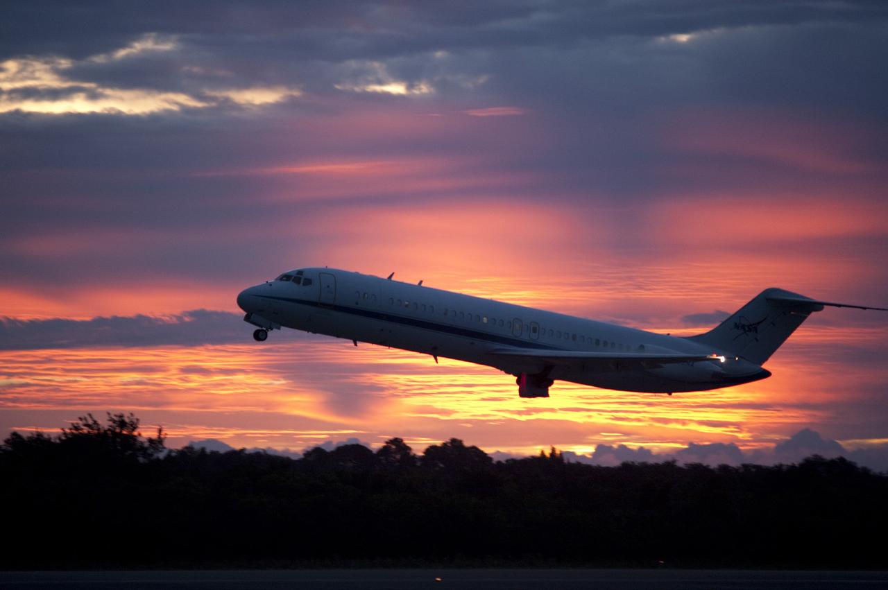 CAPE CANAVERAL, Fla. – NASA's C-9 aircraft takes off ahead of the space shuttle Endeavour, mounted atop NASA's Shuttle Carrier Aircraft or SCA at the Shuttle Landing Facility at NASA's Kennedy Space Center in Florida. The SCA, a modified 747 jetliner, will fly Endeavour to Los Angeles where it will be placed on public display at the California Science Center. This is the final ferry flight scheduled in the Space Shuttle Program era. For more information on the shuttles' transition and retirement, visit http://www.nasa.gov/transition. Photo credit: NASA/Rick Wetherington