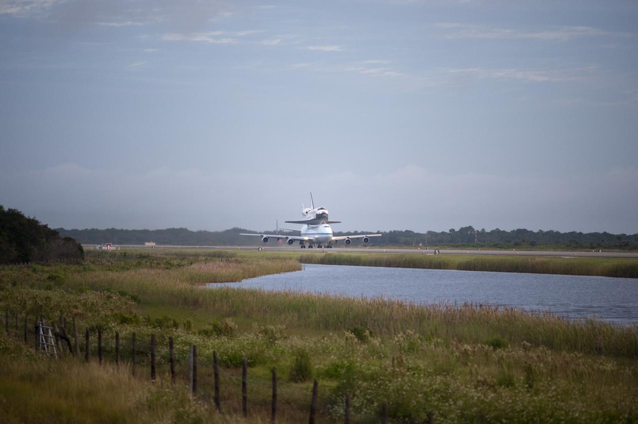 CAPE CANAVERAL, Fla. – Space shuttle Endeavour, mounted atop NASA's Shuttle Carrier Aircraft or SCA, takes off from the Shuttle Landing Facility at NASA's Kennedy Space Center in Florida. The SCA, a modified 747 jetliner, will fly Endeavour to Los Angeles where it will be placed on public display at the California Science Center. This is the final ferry flight scheduled in the Space Shuttle Program era. For more information on the shuttles' transition and retirement, visit http://www.nasa.gov/transition. Photo credit: NASA/Rick Wetherington