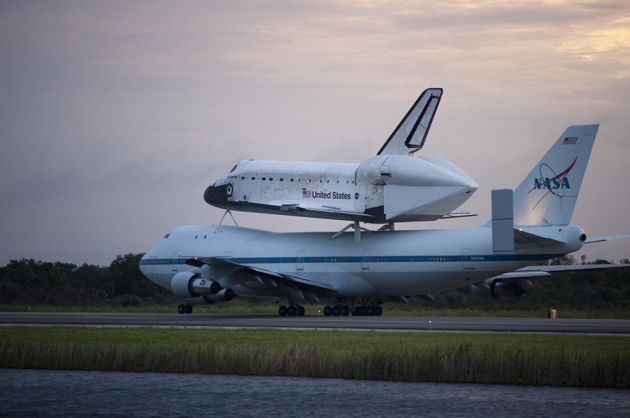 CAPE CANAVERAL, Fla. – Space shuttle Endeavour, mounted atop NASA's Shuttle Carrier Aircraft or SCA, taxis at the Shuttle Landing Facility at NASA's Kennedy Space Center in Florida. The SCA, a modified 747 jetliner, will fly Endeavour to Los Angeles where it will be placed on public display at the California Science Center. This is the final ferry flight scheduled in the Space Shuttle Program era. For more information on the shuttles' transition and retirement, visit http://www.nasa.gov/transition. Photo credit: NASA/Rick Wetherington