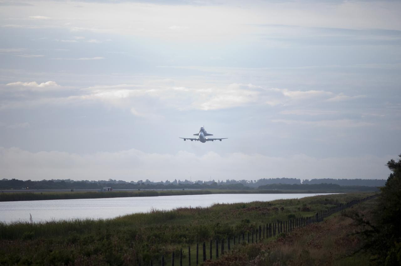 CAPE CANAVERAL, Fla. – Space shuttle Endeavour, mounted atop NASA's Shuttle Carrier Aircraft or SCA, takes off from the Shuttle Landing Facility at NASA's Kennedy Space Center in Florida. The SCA, a modified 747 jetliner, will fly Endeavour to Los Angeles where it will be placed on public display at the California Science Center. This is the final ferry flight scheduled in the Space Shuttle Program era. For more information on the shuttles' transition and retirement, visit http://www.nasa.gov/transition. Photo credit: NASA/Rick Wetherington