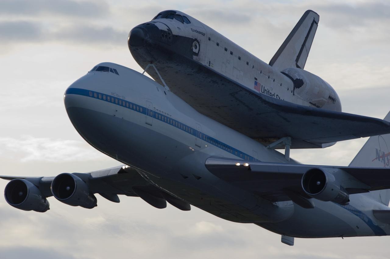 CAPE CANAVERAL, Fla. – Space shuttle Endeavour, mounted atop NASA's Shuttle Carrier Aircraft or SCA, takes off from the Shuttle Landing Facility at NASA's Kennedy Space Center in Florida. The SCA, a modified 747 jetliner, will fly Endeavour to Los Angeles where it will be placed on public display at the California Science Center. This is the final ferry flight scheduled in the Space Shuttle Program era. For more information on the shuttles' transition and retirement, visit http://www.nasa.gov/transition. Photo credit: NASA/Rick Wetherington