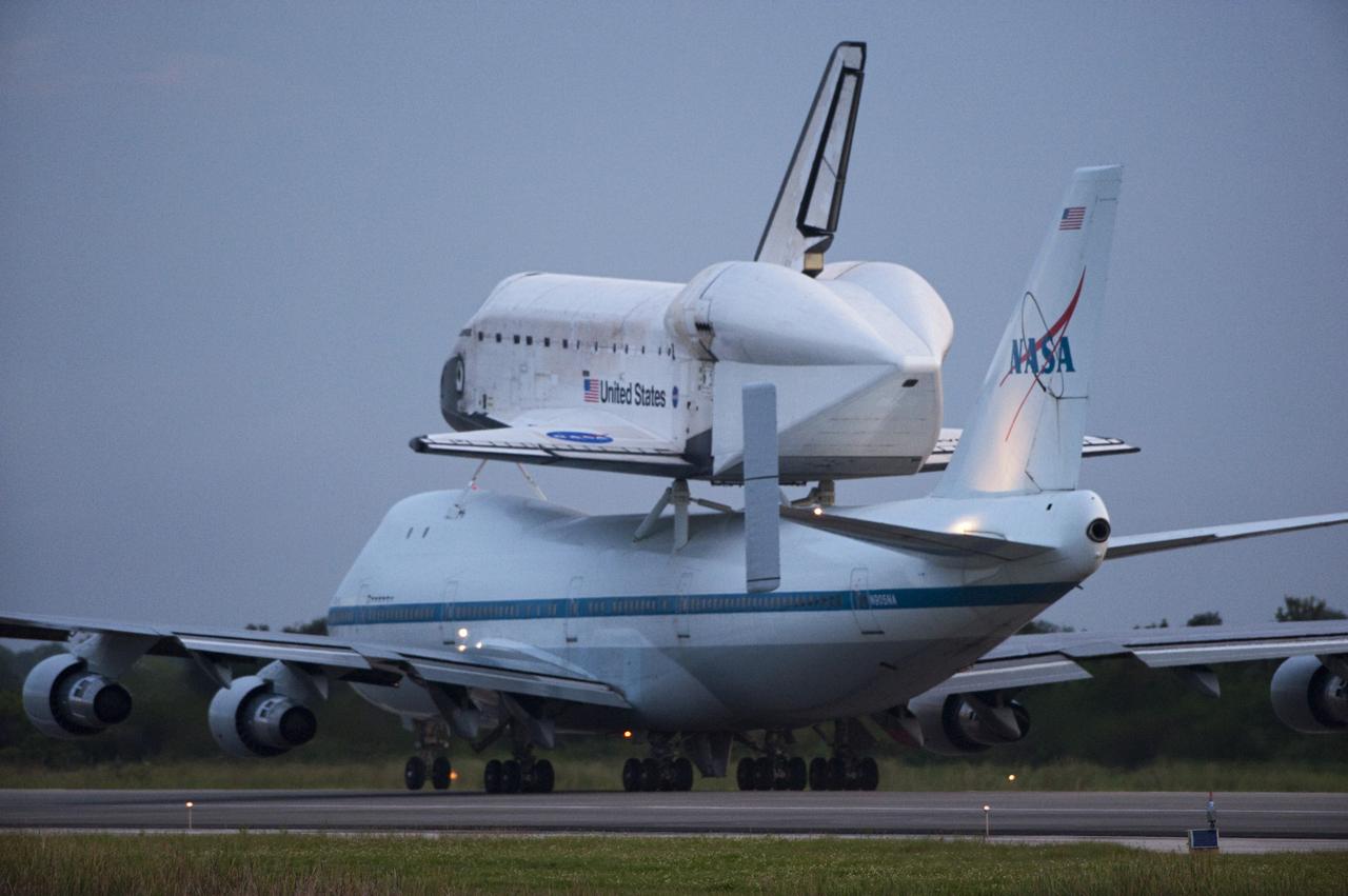 CAPE CANAVERAL, Fla. – Space shuttle Endeavour, mounted atop NASA's Shuttle Carrier Aircraft or SCA, taxis at the Shuttle Landing Facility at NASA's Kennedy Space Center in Florida. The SCA, a modified 747 jetliner, will fly Endeavour to Los Angeles where it will be placed on public display at the California Science Center. This is the final ferry flight scheduled in the Space Shuttle Program era. For more information on the shuttles' transition and retirement, visit http://www.nasa.gov/transition. Photo credit: NASA/Rick Wetherington