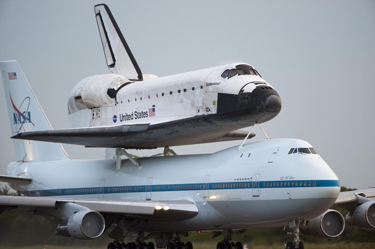 CAPE CANAVERAL, Fla. – Space shuttle Endeavour, mounted atop NASA's Shuttle Carrier Aircraft or SCA, takes off from the Shuttle Landing Facility at NASA's Kennedy Space Center in Florida. The SCA, a modified 747 jetliner, will fly Endeavour to Los Angeles where it will be placed on public display at the California Science Center. This is the final ferry flight scheduled in the Space Shuttle Program era. For more information on the shuttles' transition and retirement, visit http://www.nasa.gov/transition. Photo credit: NASA/Rick Wetherington
