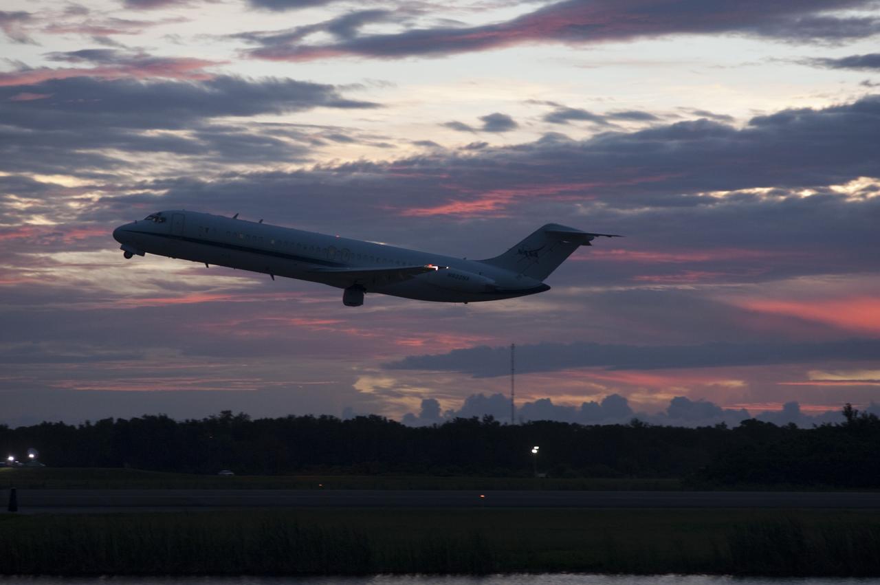 CAPE CANAVERAL, Fla. – NASA's C-9 aircraft takes off ahead of the space shuttle Endeavour, mounted atop NASA's Shuttle Carrier Aircraft or SCA at the Shuttle Landing Facility at NASA's Kennedy Space Center in Florida. The SCA, a modified 747 jetliner, will fly Endeavour to Los Angeles where it will be placed on public display at the California Science Center. This is the final ferry flight scheduled in the Space Shuttle Program era. For more information on the shuttles' transition and retirement, visit http://www.nasa.gov/transition. Photo credit: NASA/Rick Wetherington