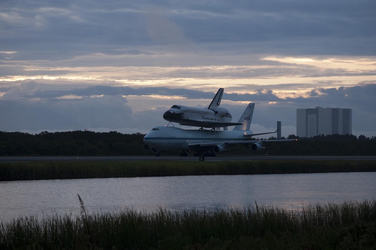 CAPE CANAVERAL, Fla. – Space shuttle Endeavour, mounted atop NASA's Shuttle Carrier Aircraft or SCA, taxis at the Shuttle Landing Facility at NASA's Kennedy Space Center in Florida. The SCA, a modified 747 jetliner, will fly Endeavour to Los Angeles where it will be placed on public display at the California Science Center. This is the final ferry flight scheduled in the Space Shuttle Program era. For more information on the shuttles' transition and retirement, visit http://www.nasa.gov/transition. Photo credit: NASA/Rick Wetherington