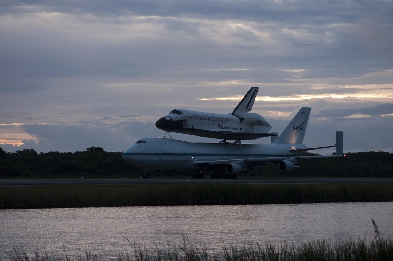 CAPE CANAVERAL, Fla. – Space shuttle Endeavour, mounted atop NASA's Shuttle Carrier Aircraft or SCA, taxis at the Shuttle Landing Facility at NASA's Kennedy Space Center in Florida. The SCA, a modified 747 jetliner, will fly Endeavour to Los Angeles where it will be placed on public display at the California Science Center. This is the final ferry flight scheduled in the Space Shuttle Program era. For more information on the shuttles' transition and retirement, visit http://www.nasa.gov/transition. Photo credit: NASA/Rick Wetherington