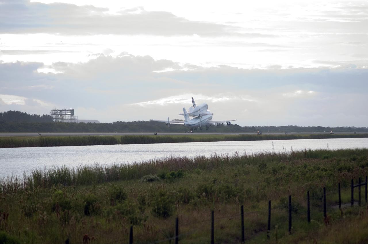 CAPE CANAVERAL, Fla. – Space shuttle Endeavour, mounted atop NASA's Shuttle Carrier Aircraft or SCA, takes off from the Shuttle Landing Facility at NASA's Kennedy Space Center in Florida. The SCA, a modified 747 jetliner, will fly Endeavour to Los Angeles where it will be placed on public display at the California Science Center. This is the final ferry flight scheduled in the Space Shuttle Program era. For more information on the shuttles' transition and retirement, visit http://www.nasa.gov/transition. Photo credit: NASA/Rick Wetherington