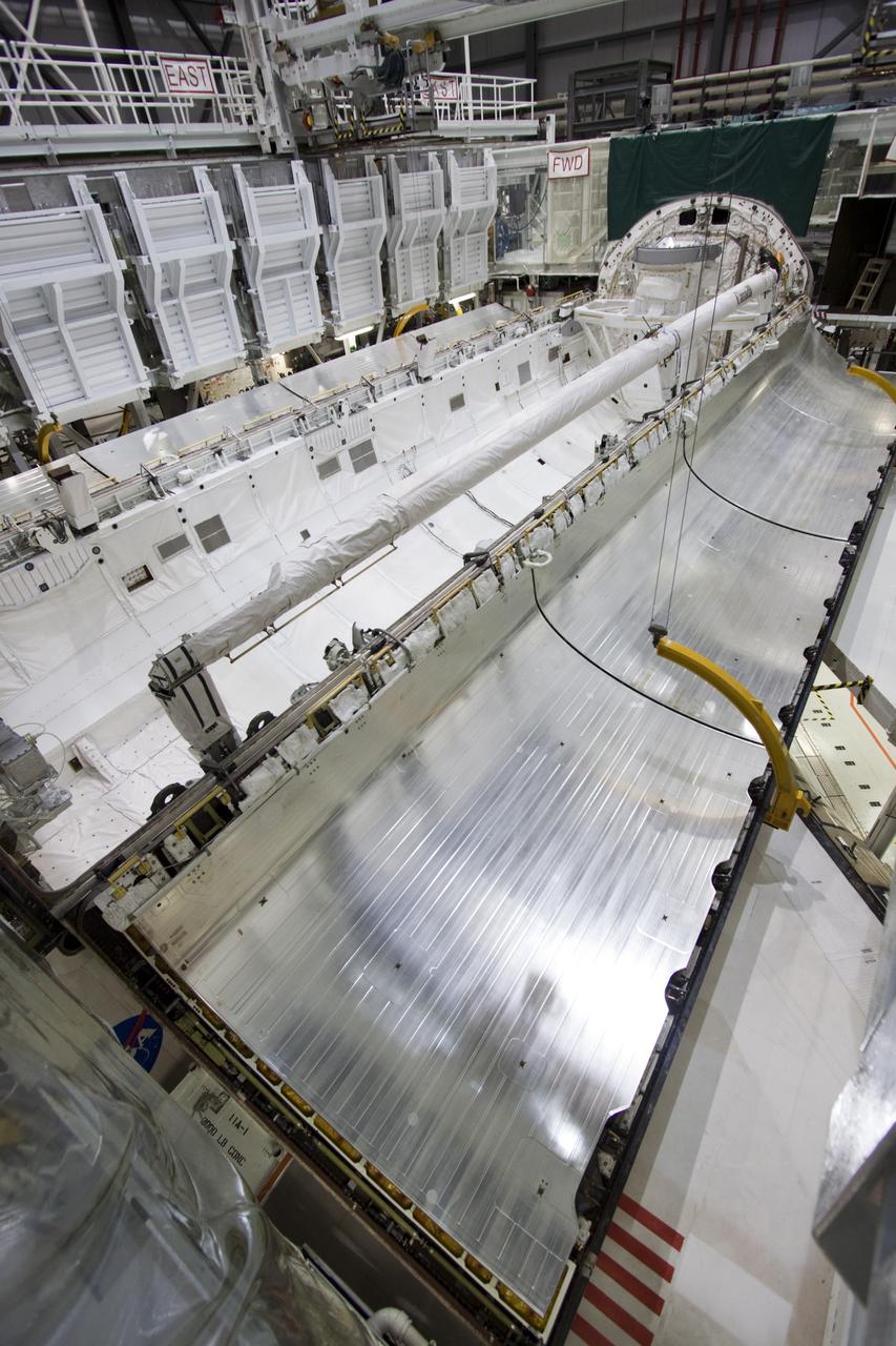 CAPE CANAVERAL, Fla. – Inside Orbiter Processing Facility-2 at NASA’s Kennedy Space Center in Florida, work will begin soon to close space shuttle Atlantis’ payload bay doors for the final time.    The orbiter is undergoing final preparations for its transfer to the Kennedy Space Center Visitor complex targeted for November. The work is part of Transition and Retirement of the remaining shuttle. Atlantis is being prepared for public display at the visitor complex. Over the course of its 26-year career, Atlantis spent 293 days in space during 33 missions. For more information, visit http://www.nasa.gov/transition. Photo credit: NASA/Jim Grossmann