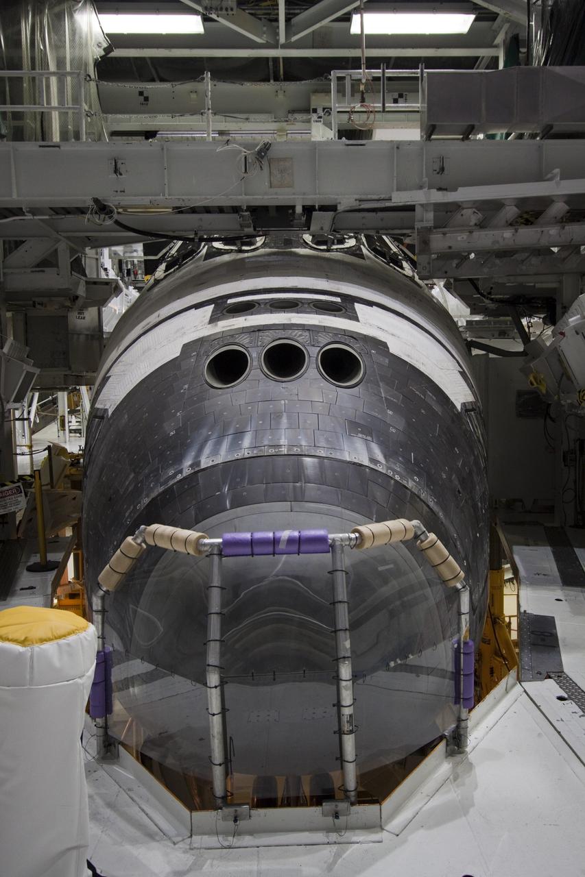CAPE CANAVERAL, Fla. – Inside Orbiter Processing Facility-2 at NASA’s Kennedy Space Center in Florida, a view of space shuttle Atlantis’ nose cone is shown as the payload bay doors are closed for the final time.    The orbiter is undergoing final preparations for its transfer to the Kennedy Space Center Visitor complex targeted for November. The work is part of Transition and Retirement of the remaining shuttle. Atlantis is being prepared for public display at the visitor complex. Over the course of its 26-year career, Atlantis spent 293 days in space during 33 missions. For more information, visit http://www.nasa.gov/transition. Photo credit: NASA/Jim Grossmann