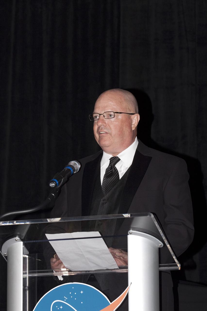 CAPE CANAVERAL, Fla. – Steve Griffin, chairman of the National Space Club Florida Committee, speaks to attendees during NASA Kennedy Space Center’s 50th Anniversary Gala event at the Kennedy Space Center Visitor Complex Apollo/Saturn V Center in Florida. The gala was coordinated by Kennedy and the National Space Club Florida Committee with the theme, “Celebrating the Past and Preparing for the Future.” The event was attended by about 650 current and retired NASA and contractor workers, dignitaries, and several former Kennedy Space Center directors. Photo credit: NASA/Kim Shiflett