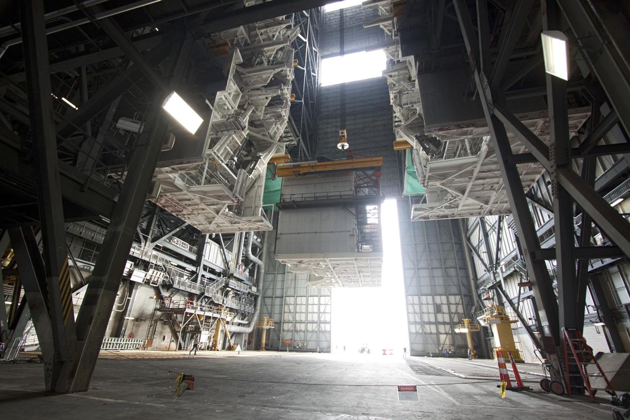 CAPE CANAVERAL, Fla. – As part of NASA's Ground Systems Development and Operations Program at the Kennedy Space Center in Florida, a large work platform is being removed from the Vehicle Assembly Building, or VAB. As part of a modernization effort, flexible settings are being designed for multiple launch vehicles instead of the whole building supporting one design. The Ground Systems Development and Operations Program is developing the necessary ground systems, infrastructure and operational approaches required to safely process, assemble, transport and launch the next generation of rockets and spacecraft in support of NASA’s exploration objectives. Future work also will replace the antiquated communications, power and vehicle access resources with modern efficient systems. Some of the utilities and systems slated for replacement have been used since the VAB opened in 1965. For more information, visit http://www.nasa.gov/exploration/systems/ground/index.html Photo credit: NASA/Jim Grossmann