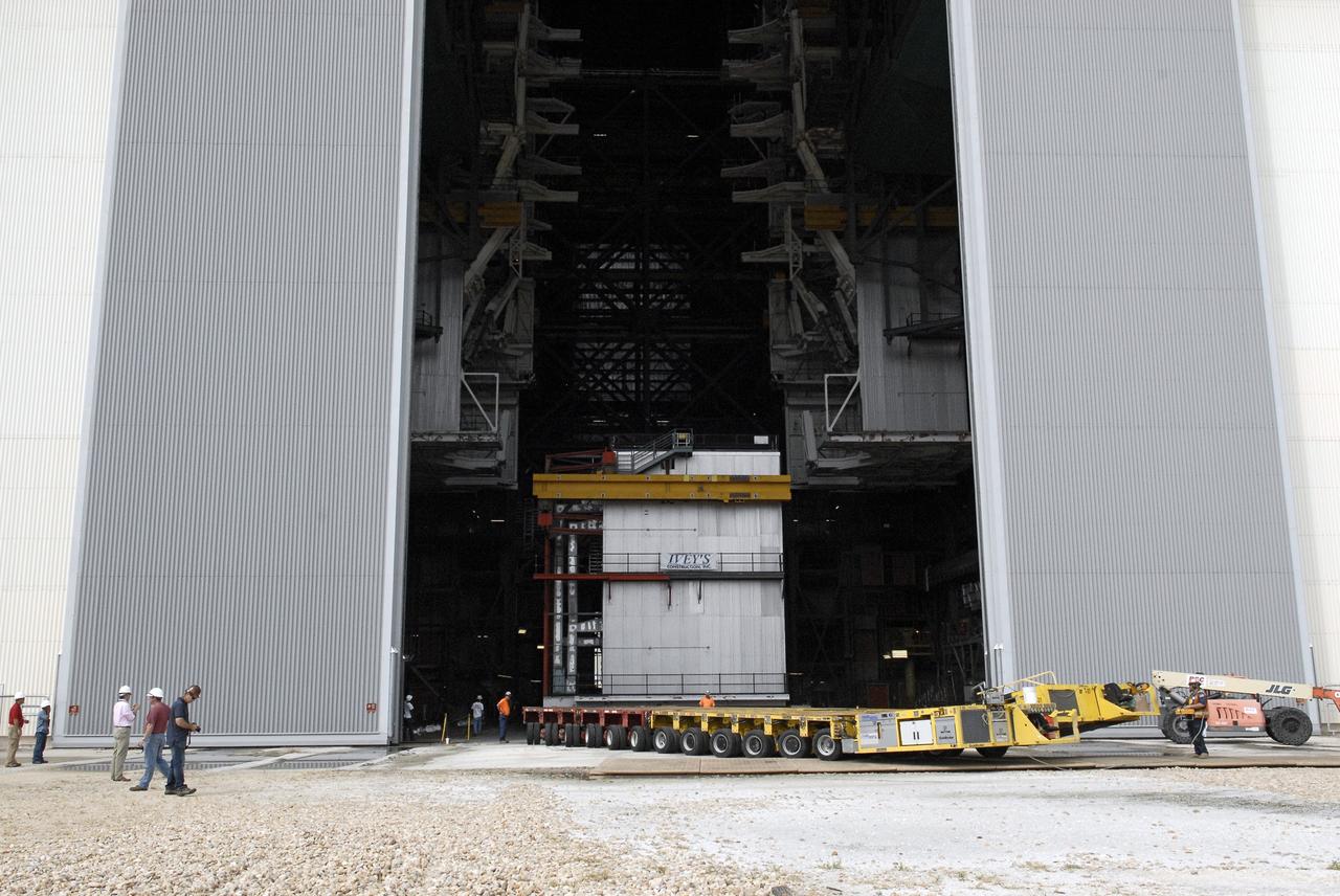 CAPE CANAVERAL, Fla. – As part of NASA's Ground Systems Development and Operations Program at the Kennedy Space Center in Florida, a work platform is lowered onto a transporter for removal from the Vehicle Assembly Building, or VAB. As part of a modernization effort, flexible settings area being designed for multiple launch vehicles instead of the whole building supporting one design. The Ground Systems Development and Operations Program is developing the necessary ground systems, infrastructure and operational approaches required to safely process, assemble, transport and launch the next generation of rockets and spacecraft in support of NASA’s exploration objectives. Future work also will replace the antiquated communications, power and vehicle access resources with modern efficient systems. Some of the utilities and systems slated for replacement have been used since the VAB opened in 1965. For more information, visit http://www.nasa.gov/exploration/systems/ground/index.html Photo credit: NASA/Charisse Nahser
