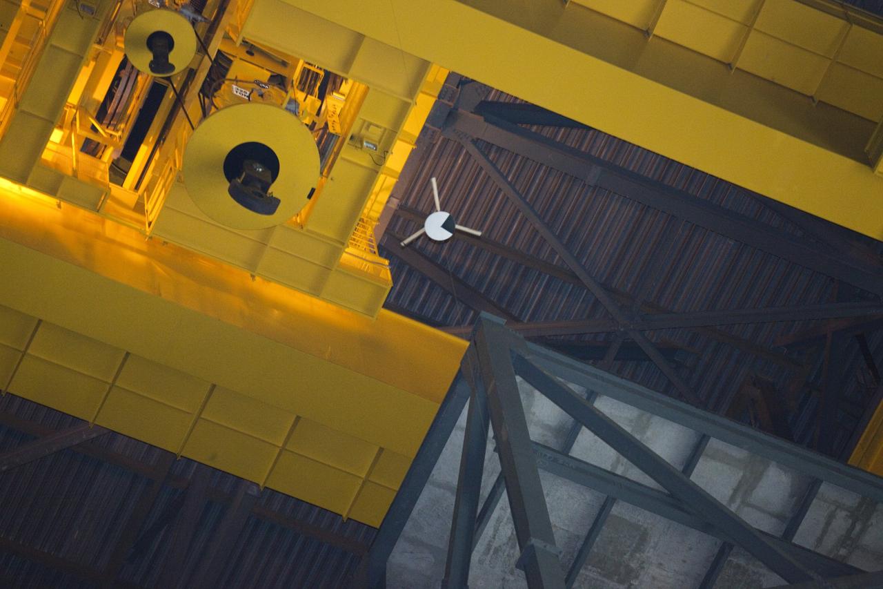 CAPE CANAVERAL, Fla. - A model capsule seen ahead of tests inside the Vehicle Assembly Building at NASA's Kennedy Space Center in Florida to test a rotor system landing design. The design would give a capsule the stability and control of a helicopter, but would not be powered. Instead, the wind passing over the rotors as the capsule descends would make the blades turn, a process called auto-rotation. The intent is to give real spacecraft a soft landing with enough control that they could touch down anywhere in the world, whether it be a runway or parking lot. In other words, wherever a helicopter could land, a spacecraft could land, too. Photo credit: NASA/Kim Shiflett