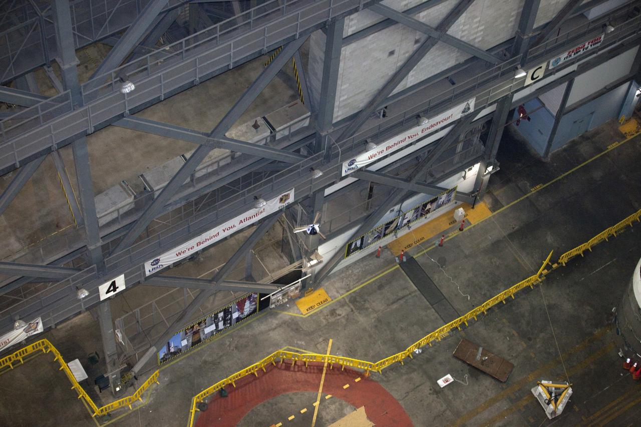 CAPE CANAVERAL, Fla. - A model capsule falls during tests inside the Vehicle Assembly Building at NASA's Kennedy Space Center in Florida to test a rotor system landing design. The design would give a capsule the stability and control of a helicopter, but would not be powered. Instead, the wind passing over the rotors as the capsule descends would make the blades turn, a process called auto-rotation. The intent is to give real spacecraft a soft landing with enough control that they could touch down anywhere in the world, whether it be a runway or parking lot. In other words, wherever a helicopter could land, a spacecraft could land, too. Photo credit: NASA/Kim Shiflett