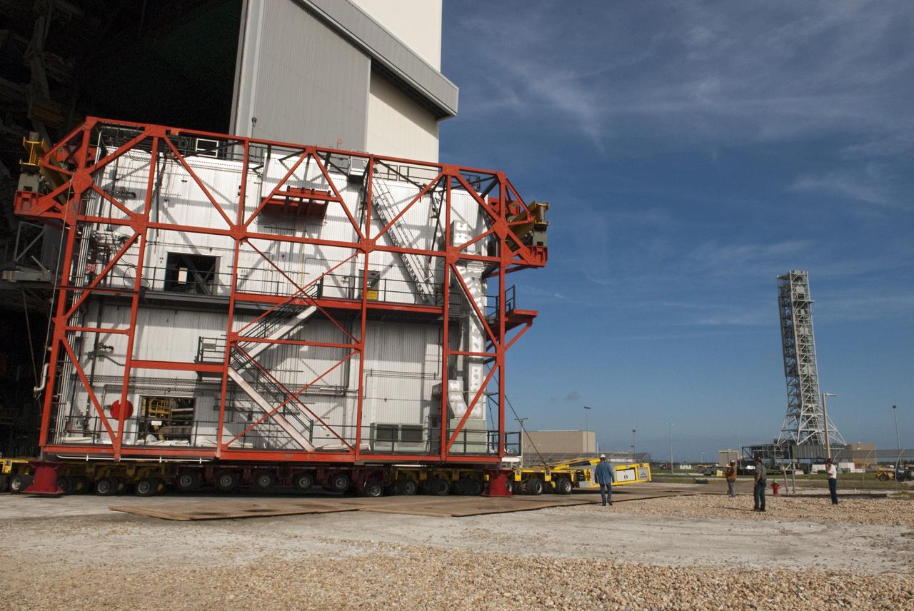 CAPE CANAVERAL, Fla. – At NASA’s Kennedy Space Center in Florida, construction workers have removed a space shuttle-era work platform from high bay 3 inside the Vehicle Assembly Building, or VAB. The platform will be moved to the VAB north parking area for temporary storage.    The work is part of a centerwide refurbishment initiative under the Ground Systems Development and Operations, or GSDO, Program. High bay 3 is being refurbished to accommodate NASA’s Space Launch System and a variety of other spacecraft.  For more information, visit http://www.nasa.gov/exploration/systems/ground/index.html. Photo credit: NASA/Charisse Nahser