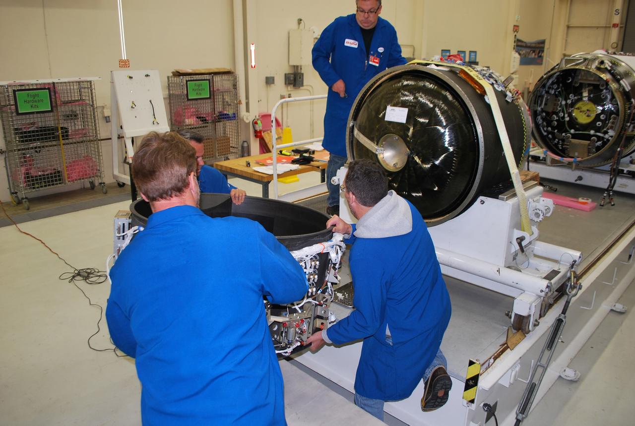 Vandenberg Air Force Base, Calif. – At Vandenberg Air Force Base in California, technicians install the avionics shelf on the third stage of the Orbital Sciences Corp. Pegasus XL rocket which will launch the Interface Region Imaging Spectrograph, or IRIS, spacecraft.      Scheduled for launch from Vandenberg Air Force Base no earlier than Feb. 27, 2013, IRIS will open a new window of discovery by tracing the flow of energy and plasma through the chromospheres and transition region into the sun’s corona using spectrometry and imaging. IRIS fills a crucial gap in our ability to advance studies of the sun-to-Earth connection by tracing the flow of energy and plasma through the foundation of the corona and the region around the sun known as the heliosphere. For more information, visit http://iris.gsfc.nasa.gov Photo credit: NASA/Randy Beaudoin