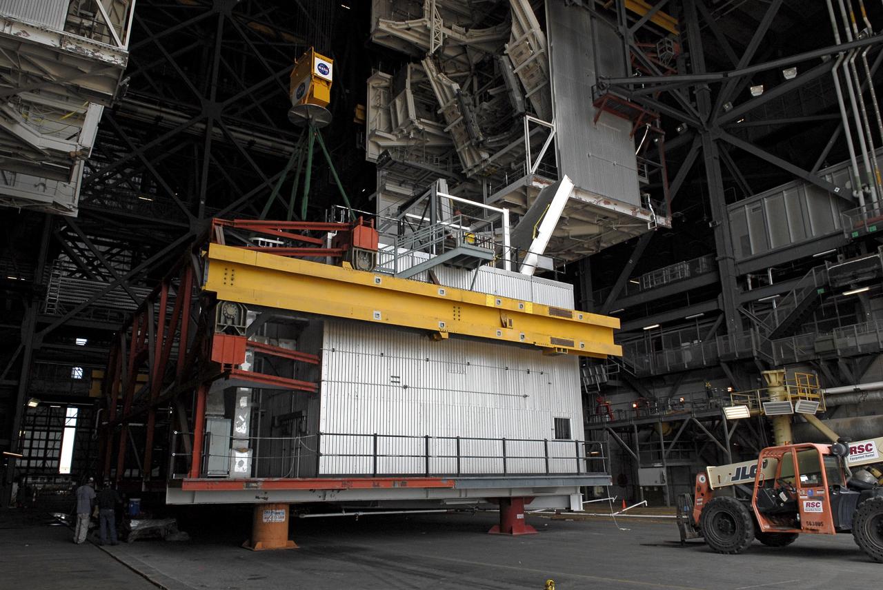 CAPE CANAVERAL, Fla. – As part of NASA's Ground Systems Development and Operations Program at the Kennedy Space Center in Florida, a large space shuttle-era work platform is being removed from high bay 3 of the Vehicle Assembly Building, or VAB. The work is part of a center-wide modernization and refurbishment initiative to accommodate NASA’s Space Launch System and a variety of other spacecraft instead of the whole building supporting one design. The Ground Systems Development and Operations Program is developing the necessary ground systems, infrastructure and operational approaches required to safely process, assemble, transport and launch the next generation of rockets and spacecraft in support of NASA’s exploration objectives. Future work also will replace the antiquated communications, power and vehicle access resources with modern efficient systems. Some of the utilities and systems slated for replacement have been used since the VAB opened in 1965. For more information, visit http://www.nasa.gov/exploration/systems/ground/index.html Photo credit: NASA/ Charisse Nahser