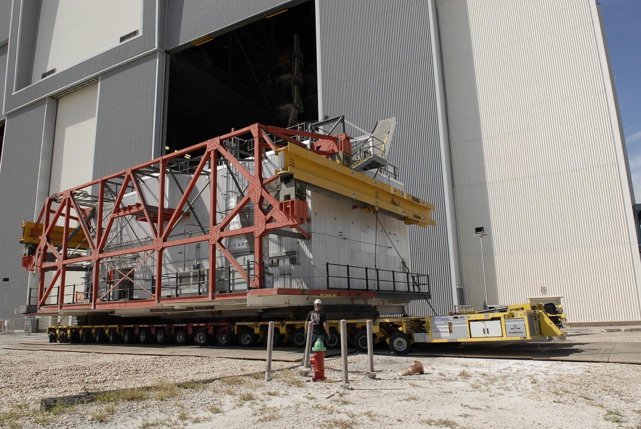 CAPE CANAVERAL, Fla. – As part of NASA's Ground Systems Development and Operations Program at the Kennedy Space Center in Florida, a large space shuttle-era work platform being removed from high bay 3 of the Vehicle Assembly Building, or VAB. The work is part of a center-wide modernization and refurbishment initiative to accommodate NASA’s Space Launch System and a variety of other spacecraft instead of the whole building supporting one design. The Ground Systems Development and Operations Program is developing the necessary ground systems, infrastructure and operational approaches required to safely process, assemble, transport and launch the next generation of rockets and spacecraft in support of NASA’s exploration objectives. Future work also will replace the antiquated communications, power and vehicle access resources with modern efficient systems. Some of the utilities and systems slated for replacement have been used since the VAB opened in 1965. For more information, visit http://www.nasa.gov/exploration/systems/ground/index.html Photo credit: NASA/ Charisse Nahser