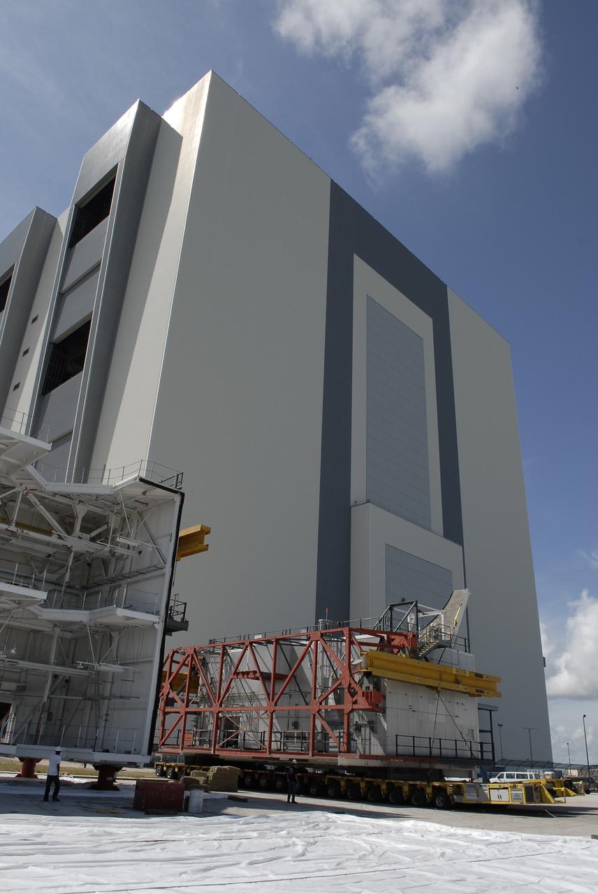CAPE CANAVERAL, Fla. – As part of NASA's Ground Systems Development and Operations Program at the Kennedy Space Center in Florida, a large space shuttle-era work platform being removed from high bay 3 of the Vehicle Assembly Building, or VAB. The work is part of a center-wide modernization and refurbishment initiative to accommodate NASA’s Space Launch System and a variety of other spacecraft instead of the whole building supporting one design. The Ground Systems Development and Operations Program is developing the necessary ground systems, infrastructure and operational approaches required to safely process, assemble, transport and launch the next generation of rockets and spacecraft in support of NASA’s exploration objectives. Future work also will replace the antiquated communications, power and vehicle access resources with modern efficient systems. Some of the utilities and systems slated for replacement have been used since the VAB opened in 1965. For more information, visit http://www.nasa.gov/exploration/systems/ground/index.html Photo credit: NASA/ Charisse Nahser