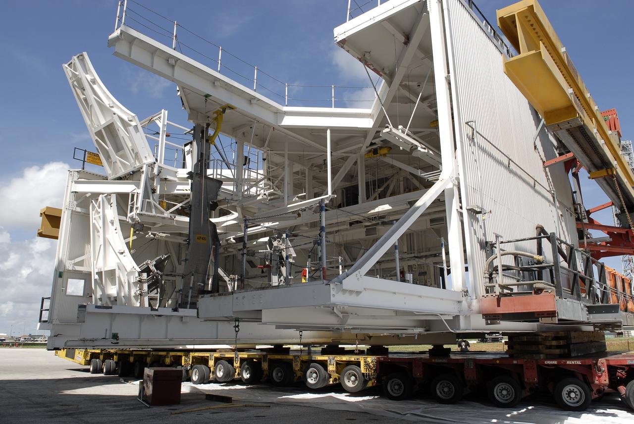 CAPE CANAVERAL, Fla. – As part of NASA's Ground Systems Development and Operations Program at the Kennedy Space Center in Florida, a large space shuttle-era work platform being removed from the Vehicle Assembly Building, or VAB. The work is part of a center-wide modernization and refurbishment initiative to accommodate NASA’s Space Launch System and a variety of other spacecraft instead of the whole building supporting one design. The Ground Systems Development and Operations Program is developing the necessary ground systems, infrastructure and operational approaches required to safely process, assemble, transport and launch the next generation of rockets and spacecraft in support of NASA’s exploration objectives. Future work also will replace the antiquated communications, power and vehicle access resources with modern efficient systems. Some of the utilities and systems slated for replacement have been used since the VAB opened in 1965. For more information, visit http://www.nasa.gov/exploration/systems/ground/index.html Photo credit: NASA/ Charisse Nahser