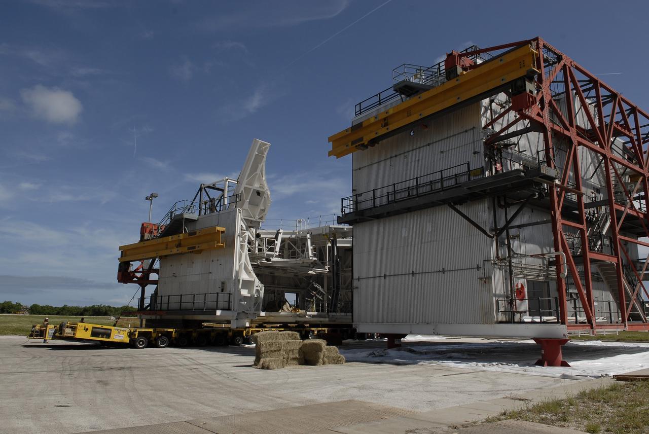CAPE CANAVERAL, Fla. – As part of NASA's Ground Systems Development and Operations Program at the Kennedy Space Center in Florida, a large space shuttle-era work platform has been removed from the Vehicle Assembly Building, or VAB. The work is part of a center-wide modernization and refurbishment initiative to accommodate NASA’s Space Launch System and a variety of other spacecraft instead of the whole building supporting one design. The Ground Systems Development and Operations Program is developing the necessary ground systems, infrastructure and operational approaches required to safely process, assemble, transport and launch the next generation of rockets and spacecraft in support of NASA’s exploration objectives. Future work also will replace the antiquated communications, power and vehicle access resources with modern efficient systems. Some of the utilities and systems slated for replacement have been used since the VAB opened in 1965. For more information, visit http://www.nasa.gov/exploration/systems/ground/index.html Photo credit: NASA/ Charisse Nahser