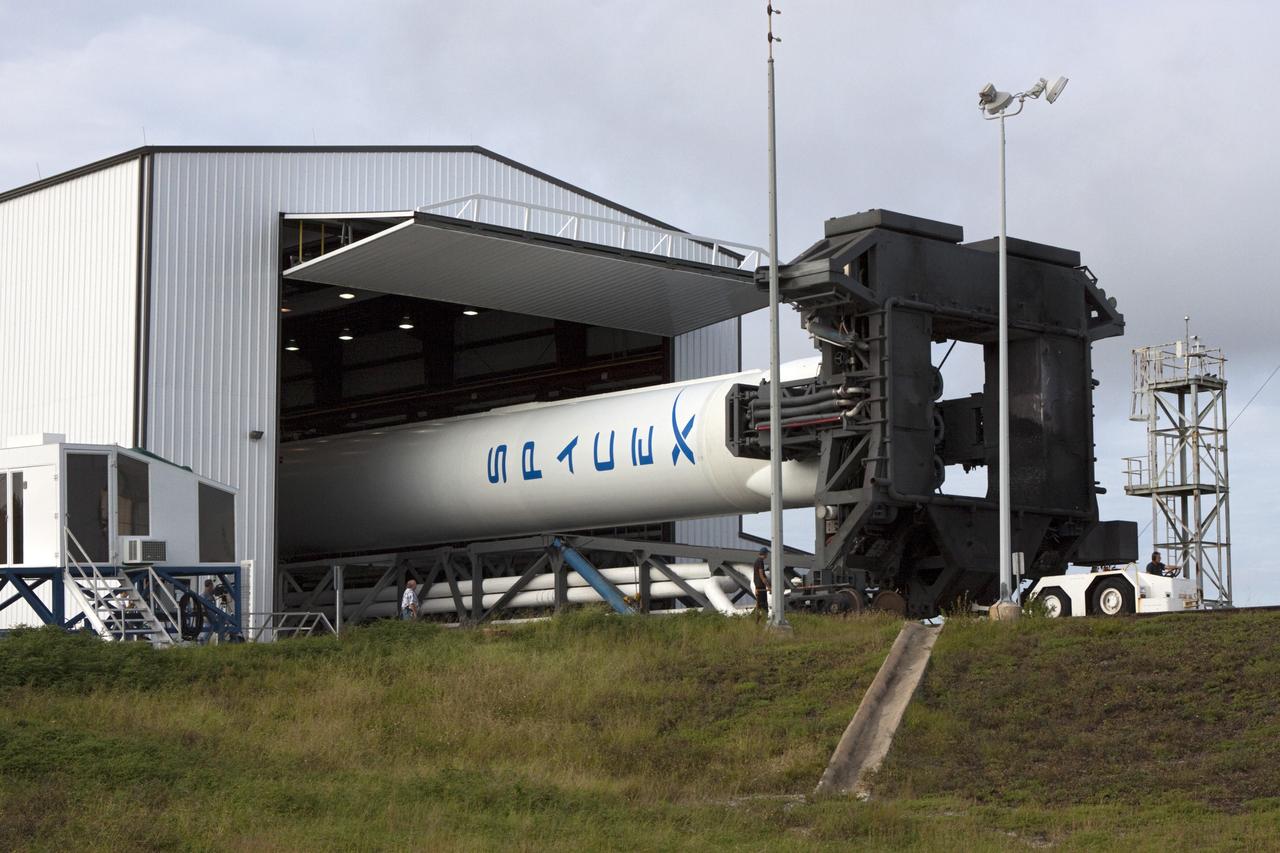 CAPE CANAVERAL, Fla. -- The Space Exploration Technologies Corp., or SpaceX, Falcon 9 rocket with Dragon capsule attached on top begins a rollout demonstration test to Space Launch Complex-40 at Cape Canaveral Air Force Station in Florida. Preparations continue for NASA’s first Commercial Resupply Services, or CRS-1, mission to the International Space Station.    The rollout to the pad for liftoff is planned for Sunday morning, Oct. 7. Liftoff from CCAFS is scheduled during an instantaneous window at 8:35 p.m. EDT Sunday evening. SpaceX CRS-1 is an important step toward making America’s microgravity research program self-sufficient by providing a way to deliver and return significant amounts of cargo, including science experiments, to and from the orbiting laboratory. To learn more, visit http://www.nasa.gov/mission_pages/station/living/launch/index.html. Photo credit: NASA/Jim Grossmann