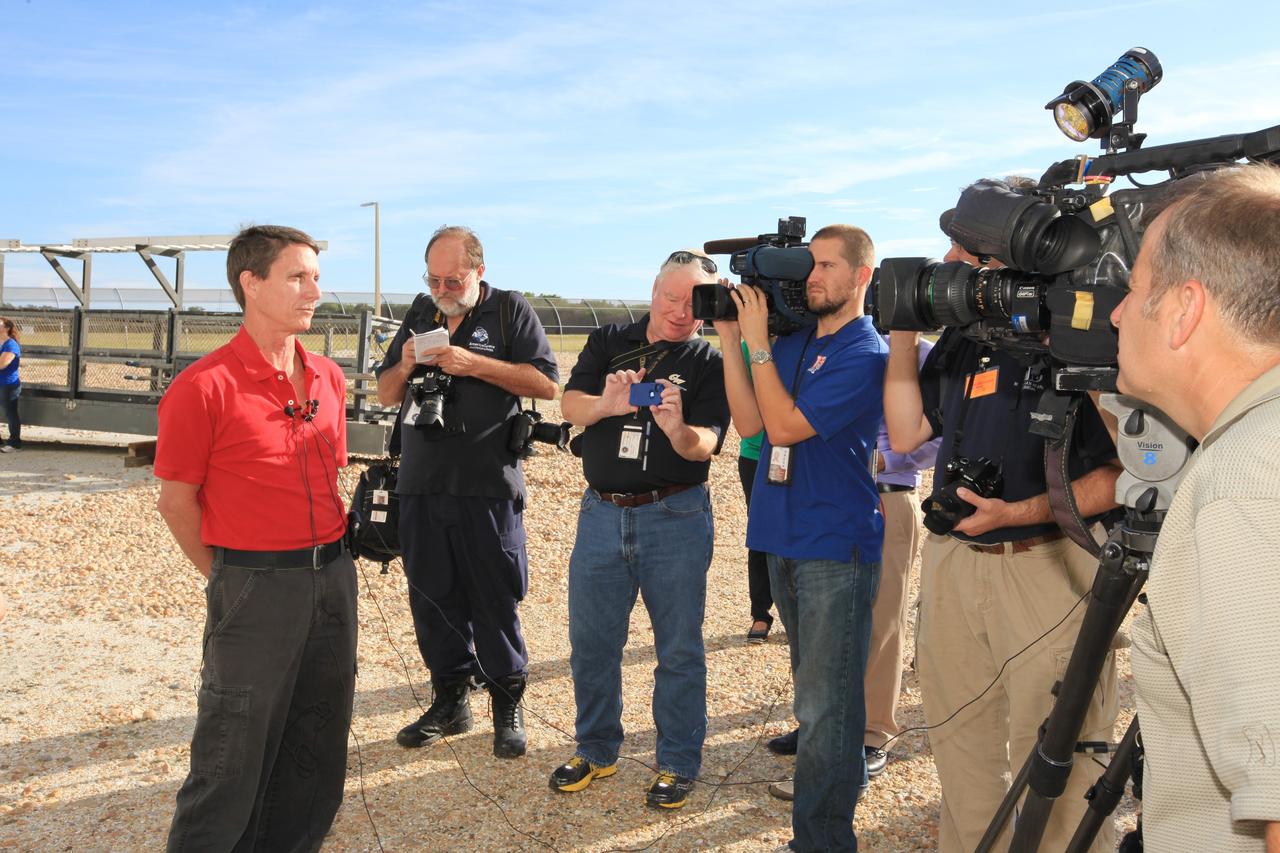 CAPE CANAVERAL, Fla. – At NASA’s Kennedy Space Center in Florida, Jim Bolton, head of operations in the Vehicle Assembly Building, talks with news media about the removal of a space shuttle-era work platform from high bay 3 inside the VAB. The platform has been moved to the VAB north parking area for temporary storage. The work is part of a center-wide refurbishment initiative under the Ground Systems Development and Operations, or GSDO, Program. High bay 3 is being refurbished to accommodate NASA’s Space Launch System and a variety of other spacecraft. Photo credit: NASA/Kim Shiflett