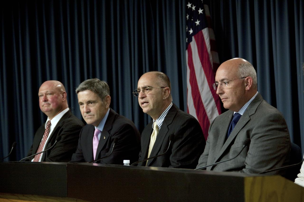 CAPE CANAVERAL, Fla. -- Sam Scimemi, director of International Space Station at NASA Headquarters, participates in a prelaunch news conference in Kennedy Space Center's Press Site auditorium in Florida. Also pictured are, from left, Michael Curie, NASA Public Affairs, Bob Cabana, director of NASA Kennedy Space Center, and to Scimemi's right, Mike Suffredini, program manager of International Space Station at NASA Johnson Space Center.    The news conference provided the media with a status on the readiness to launch NASA's first Commercial Resupply Services, or CRS-1, mission to the International Space Station. Space Exploration Technologies Corp., or SpaceX, built both the mission's Falcon 9 rocket and Dragon capsule. Launch is scheduled for 8:35 p.m. EDT on Oct. 7 from Space Launch Complex 40 on Cape Canaveral Air Force Station.  SpaceX CRS-1 is an important step toward making America’s microgravity research program self-sufficient by providing a way to deliver and return significant amounts of cargo, including science experiments, to and from the orbiting laboratory. NASA has contracted for 12 commercial resupply flights from SpaceX and eight from the Orbital Sciences Corp. For more information, visit http://www.nasa.gov/mission_pages/station/living/launch/index.html.  Photo credit: NASA/Jim Grossmann
