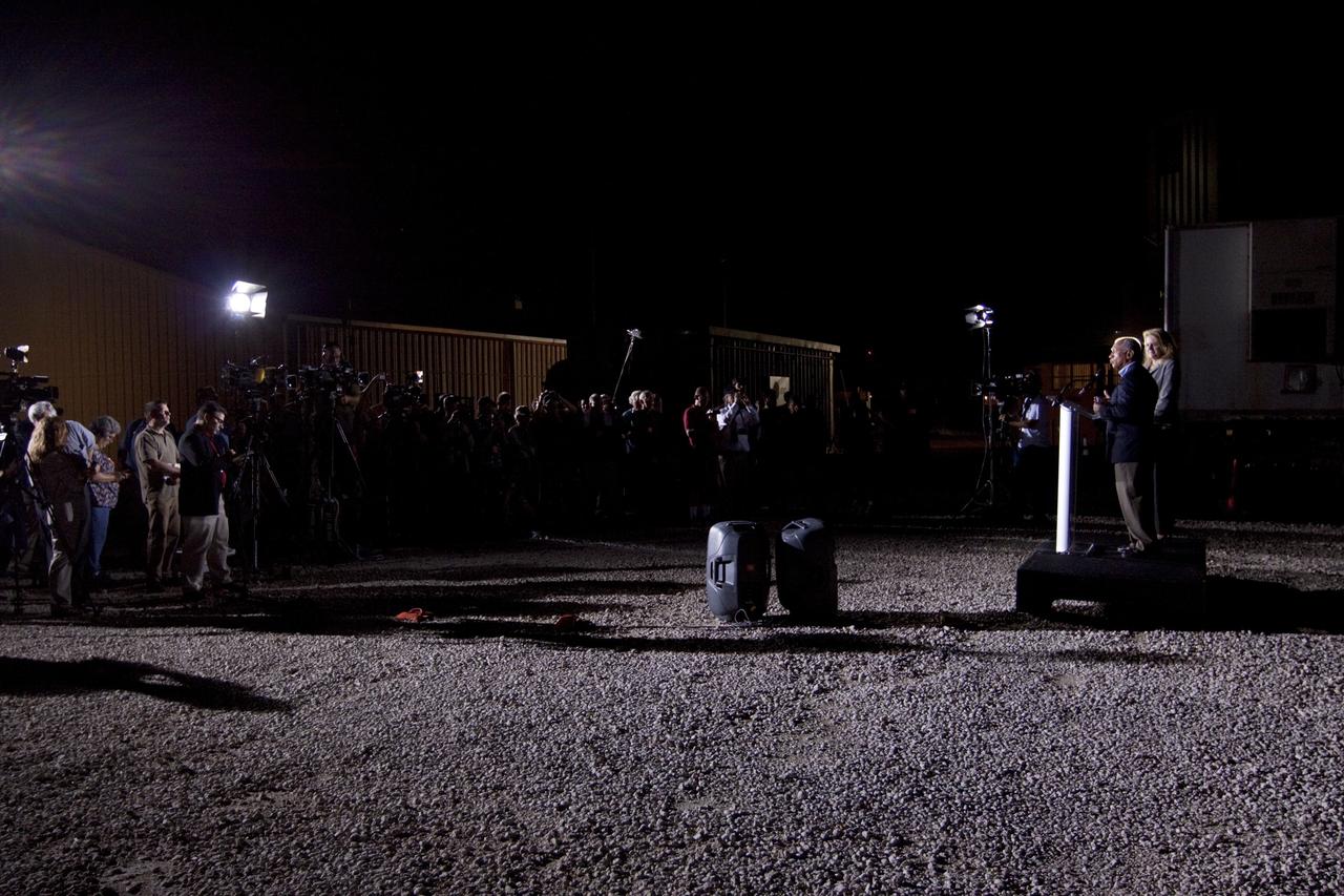 CAPE CANAVERAL, Fla. -- NASA Administrator Charlie Bolden addresses news and social media representatives at the Press Site at NASA's Kennedy Space Center in Florida following the successful launch of NASA's first Commercial Resupply Services, or CRS-1, mission to the International Space Station. Beside him on the podium is Gwynne Shotwell, president of Space Exploration Technologies Corp., or SpaceX.     SpaceX built both the Falcon 9 rocket and Dragon capsule that launched at 8:35 p.m. EDT from Space Launch Complex 40 on Cape Canaveral Air Force Station. SpaceX CRS-1 is an important step toward making America’s microgravity research program self-sufficient by providing a way to deliver and return significant amounts of cargo, including science experiments, to and from the orbiting laboratory. NASA has contracted for 12 commercial resupply flights from SpaceX and eight from the Orbital Sciences Corp. For more information, visit http://www.nasa.gov/mission_pages/station/living/launch/index.html. Photo credit: NASA/Kim Shiflett