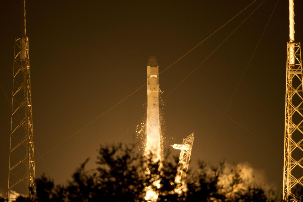 CAPE CANAVERAL, Fla. - At Space Launch Complex 40 on Cape Canaveral Air Force Station in Florida a Falcon 9 rocket carrying a Dragon capsule lifts off at 8:35 p.m. EDT. Space Exploration Technologies Corp., or SpaceX, built both the rocket and capsule for NASA's first Commercial Resupply Services, or CRS-1, mission to the International Space Station.      SpaceX CRS-1 is an important step toward making America’s microgravity research program self-sufficient by providing a way to deliver and return significant amounts of cargo, including science experiments, to and from the orbiting laboratory. NASA has contracted for 12 commercial resupply flights from SpaceX and eight from the Orbital Sciences Corp. For more information, visit http://www.nasa.gov/mission_pages/station/living/launch/index.html  Photo credit: NASA/Ken Allen