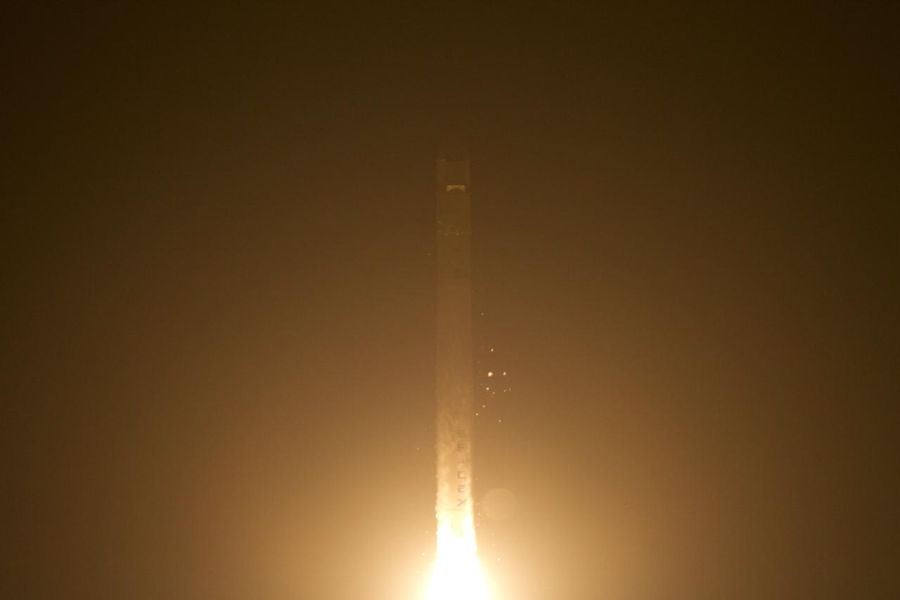 CAPE CANAVERAL, Fla. - At Space Launch Complex 40 on Cape Canaveral Air Force Station in Florida a Falcon 9 rocket carrying a Dragon capsule lifts off at 8:35 p.m. EDT. Space Exploration Technologies Corp., or SpaceX, built both the rocket and capsule for NASA's first Commercial Resupply Services, or CRS-1, mission to the International Space Station.      SpaceX CRS-1 is an important step toward making America’s microgravity research program self-sufficient by providing a way to deliver and return significant amounts of cargo, including science experiments, to and from the orbiting laboratory. NASA has contracted for 12 commercial resupply flights from SpaceX and eight from the Orbital Sciences Corp. For more information, visit http://www.nasa.gov/mission_pages/station/living/launch/index.html  Photo credit: NASA/Ken Allen