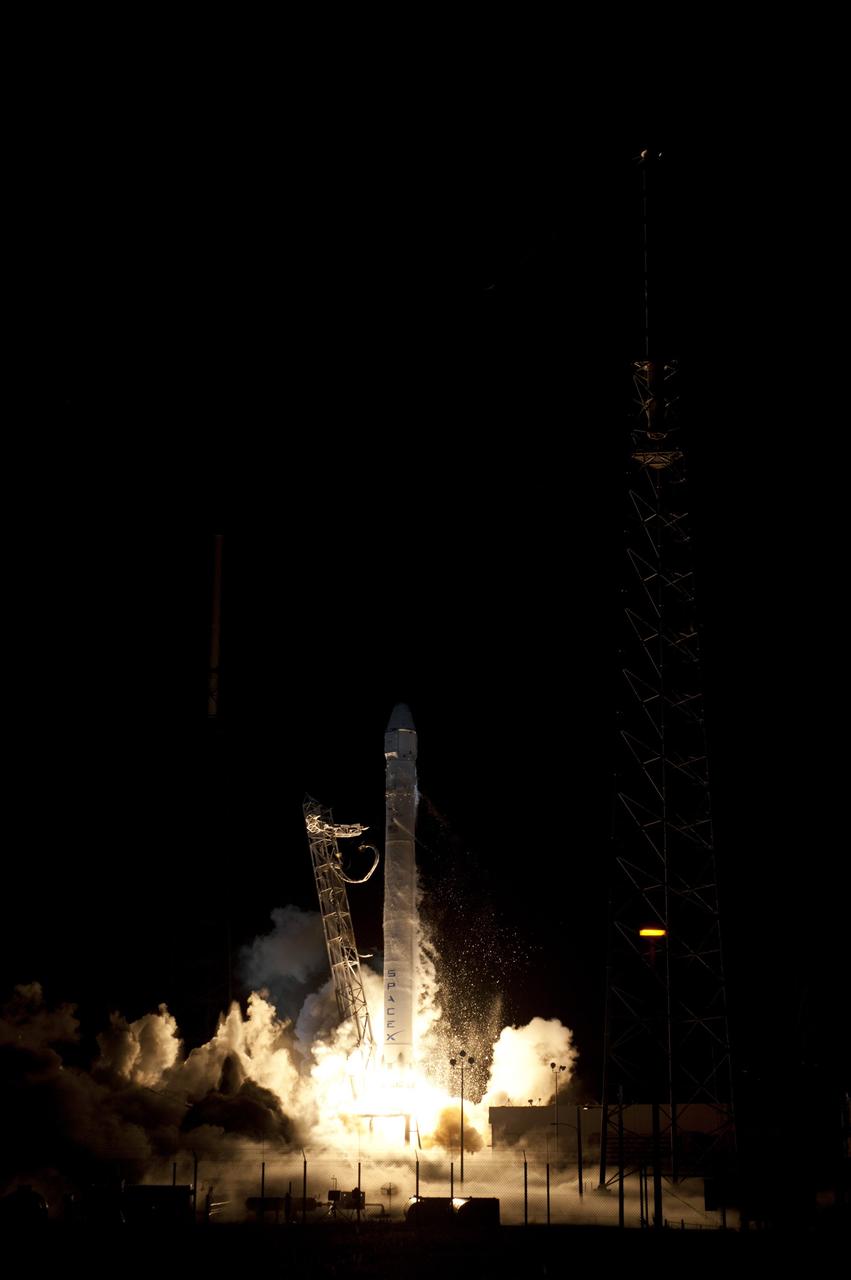 CAPE CANAVERAL, Fla. - Space Launch Complex 40 on Cape Canaveral Air Force Station in Florida comes alive as the Merlin engines ignite under the Falcon 9 rocket carrying a Dragon capsule to orbit. Liftoff was at 8:35 p.m. EDT. Space Exploration Technologies Corp., or SpaceX, built both the rocket and capsule for NASA's first Commercial Resupply Services, or CRS-1, mission to the International Space Station.    SpaceX CRS-1 is an important step toward making America’s microgravity research program self-sufficient by providing a way to deliver and return significant amounts of cargo, including science experiments, to and from the orbiting laboratory. NASA has contracted for 12 commercial resupply flights from SpaceX and eight from the Orbital Sciences Corp. For more information, visit http://www.nasa.gov/mission_pages/station/living/launch/index.html  Photo credit: NASA/Rick Wetherington and Tony Gray