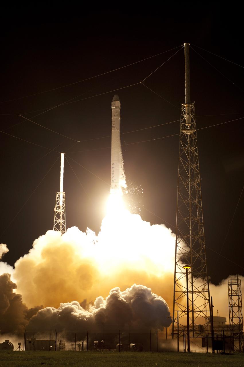 CAPE CANAVERAL, Fla. - Space Launch Complex 40 on Cape Canaveral Air Force Station in Florida comes alive as the Merlin engines ignite under the Falcon 9 rocket carrying a Dragon capsule to orbit. Liftoff was at 8:35 p.m. EDT. Space Exploration Technologies Corp., or SpaceX, built both the rocket and capsule for NASA's first Commercial Resupply Services, or CRS-1, mission to the International Space Station.    SpaceX CRS-1 is an important step toward making America’s microgravity research program self-sufficient by providing a way to deliver and return significant amounts of cargo, including science experiments, to and from the orbiting laboratory. NASA has contracted for 12 commercial resupply flights from SpaceX and eight from the Orbital Sciences Corp. For more information, visit http://www.nasa.gov/mission_pages/station/living/launch/index.html  Photo credit: NASA/Rick Wetherington and Tony Gray