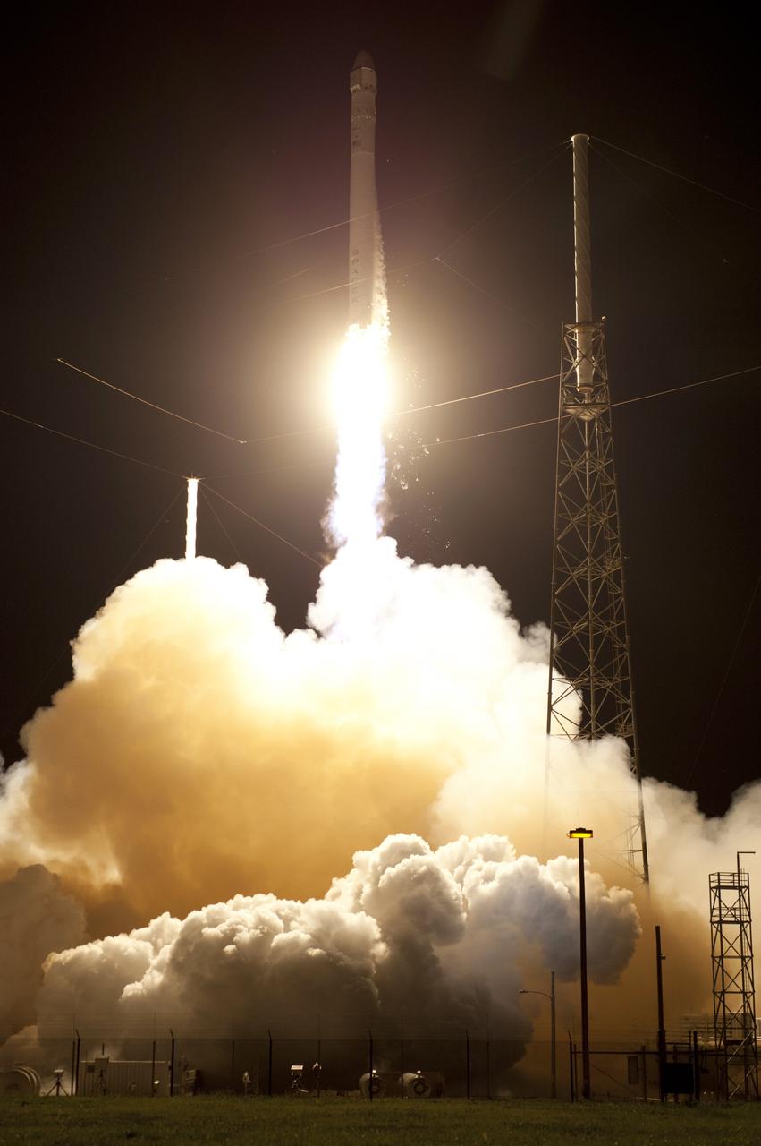 CAPE CANAVERAL, Fla. - Space Launch Complex 40 on Cape Canaveral Air Force Station in Florida comes alive as the Merlin engines ignite under the Falcon 9 rocket carrying a Dragon capsule to orbit. Liftoff was at 8:35 p.m. EDT. Space Exploration Technologies Corp., or SpaceX, built both the rocket and capsule for NASA's first Commercial Resupply Services, or CRS-1, mission to the International Space Station.    SpaceX CRS-1 is an important step toward making America’s microgravity research program self-sufficient by providing a way to deliver and return significant amounts of cargo, including science experiments, to and from the orbiting laboratory. NASA has contracted for 12 commercial resupply flights from SpaceX and eight from the Orbital Sciences Corp. For more information, visit http://www.nasa.gov/mission_pages/station/living/launch/index.html  Photo credit: NASA/Rick Wetherington and Tony Gray