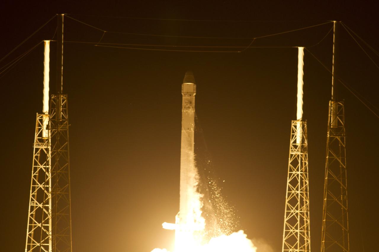 CAPE CANAVERAL, Fla. - Space Launch Complex 40 on Cape Canaveral Air Force Station in Florida comes alive as the Merlin engines ignite under the Falcon 9 rocket carrying a Dragon capsule to orbit. Liftoff was at 8:35 p.m. EDT. Space Exploration Technologies Corp., or SpaceX, built both the rocket and capsule for NASA's first Commercial Resupply Services, or CRS-1, mission to the International Space Station.    SpaceX CRS-1 is an important step toward making America’s microgravity research program self-sufficient by providing a way to deliver and return significant amounts of cargo, including science experiments, to and from the orbiting laboratory. NASA has contracted for 12 commercial resupply flights from SpaceX and eight from the Orbital Sciences Corp. For more information, visit http://www.nasa.gov/mission_pages/station/living/launch/index.html  Photo credit: NASA/Gina Mitchell and George Roberts