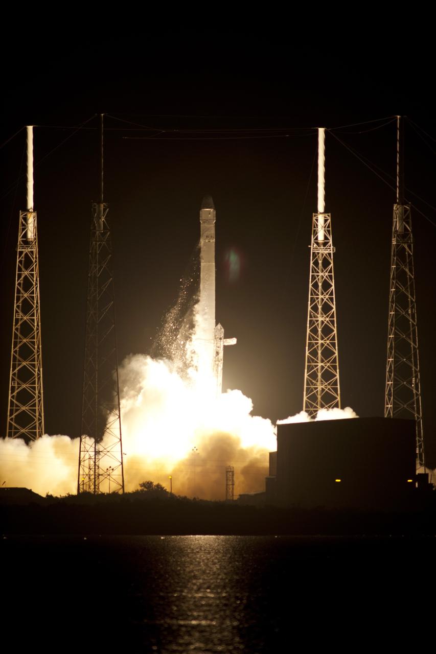 CAPE CANAVERAL, Fla. - Space Launch Complex 40 on Cape Canaveral Air Force Station in Florida comes alive as the Merlin engines ignite under the Falcon 9 rocket carrying a Dragon capsule to orbit. Liftoff was at 8:35 p.m. EDT. Space Exploration Technologies Corp., or SpaceX, built both the rocket and capsule for NASA's first Commercial Resupply Services, or CRS-1, mission to the International Space Station.      SpaceX CRS-1 is an important step toward making America’s microgravity research program self-sufficient by providing a way to deliver and return significant amounts of cargo, including science experiments, to and from the orbiting laboratory. NASA has contracted for 12 commercial resupply flights from SpaceX and eight from the Orbital Sciences Corp. For more information, visit http://www.nasa.gov/mission_pages/station/living/launch/index.html  Photo credit: NASA/Tony Gray