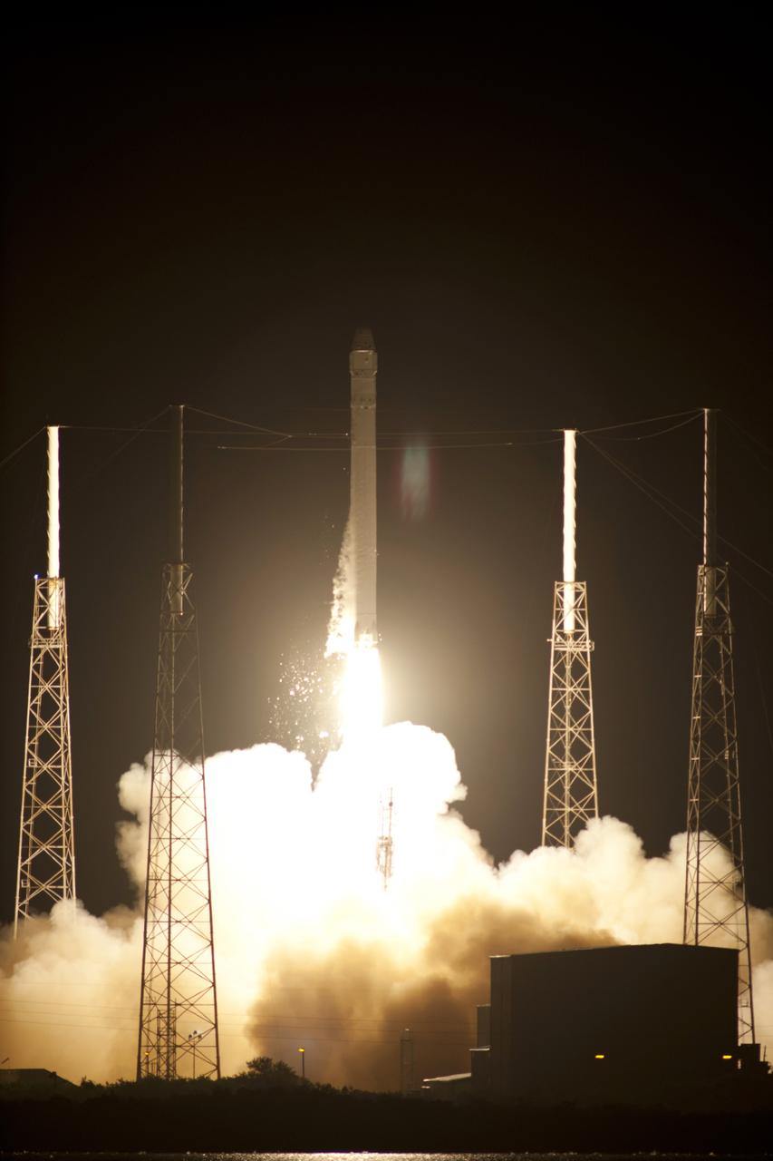 CAPE CANAVERAL, Fla. - Space Launch Complex 40 on Cape Canaveral Air Force Station in Florida comes alive as the Merlin engines ignite under the Falcon 9 rocket carrying a Dragon capsule to orbit. Liftoff was at 8:35 p.m. EDT. Space Exploration Technologies Corp., or SpaceX, built both the rocket and capsule for NASA's first Commercial Resupply Services, or CRS-1, mission to the International Space Station.      SpaceX CRS-1 is an important step toward making America’s microgravity research program self-sufficient by providing a way to deliver and return significant amounts of cargo, including science experiments, to and from the orbiting laboratory. NASA has contracted for 12 commercial resupply flights from SpaceX and eight from the Orbital Sciences Corp. For more information, visit http://www.nasa.gov/mission_pages/station/living/launch/index.html  Photo credit: NASA/Tony Gray