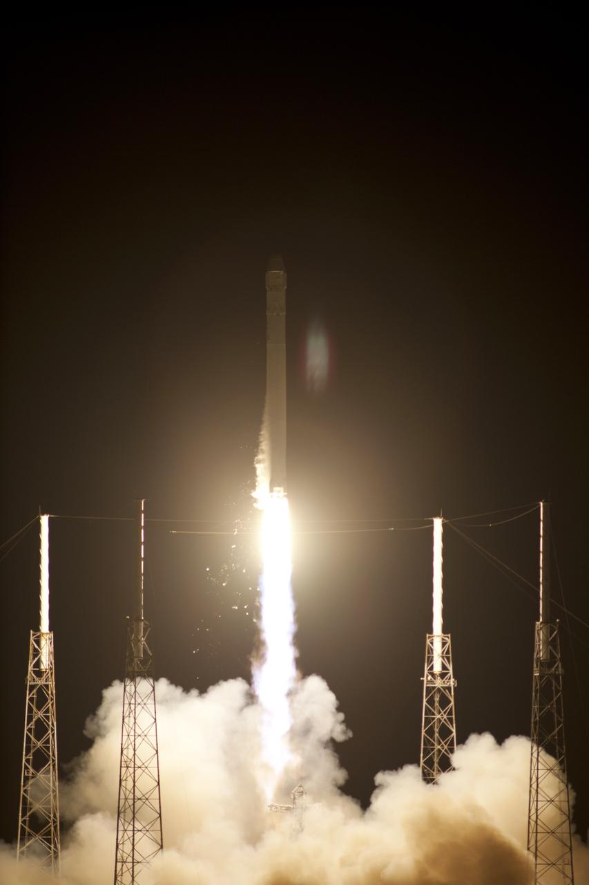 CAPE CANAVERAL, Fla. - At Space Launch Complex 40 on Cape Canaveral Air Force Station in Florida a Falcon 9 rocket carrying a Dragon capsule lifts off at 8:35 p.m. EDT. Space Exploration Technologies Corp., or SpaceX, built both the rocket and capsule for NASA's first Commercial Resupply Services, or CRS-1, mission to the International Space Station.      SpaceX CRS-1 is an important step toward making America’s microgravity research program self-sufficient by providing a way to deliver and return significant amounts of cargo, including science experiments, to and from the orbiting laboratory. NASA has contracted for 12 commercial resupply flights from SpaceX and eight from the Orbital Sciences Corp. For more information, visit http://www.nasa.gov/mission_pages/station/living/launch/index.html  Photo credit: NASA/Tony Gray