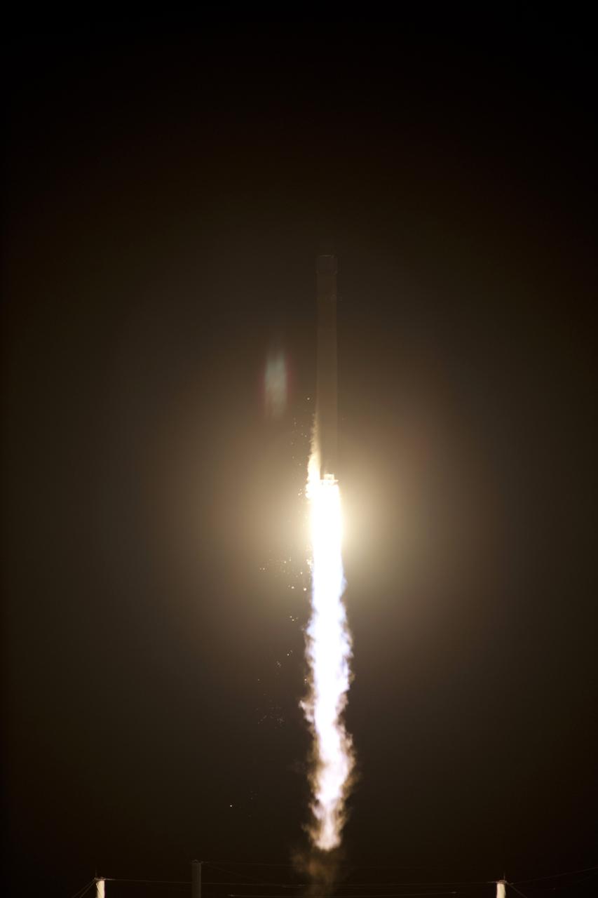 CAPE CANAVERAL, Fla. - At Space Launch Complex 40 on Cape Canaveral Air Force Station in Florida a Falcon 9 rocket carrying a Dragon capsule lifts off at 8:35 p.m. EDT. Space Exploration Technologies Corp., or SpaceX, built both the rocket and capsule for NASA's first Commercial Resupply Services, or CRS-1, mission to the International Space Station.      SpaceX CRS-1 is an important step toward making America’s microgravity research program self-sufficient by providing a way to deliver and return significant amounts of cargo, including science experiments, to and from the orbiting laboratory. NASA has contracted for 12 commercial resupply flights from SpaceX and eight from the Orbital Sciences Corp. For more information, visit http://www.nasa.gov/mission_pages/station/living/launch/index.html  Photo credit: NASA/Tony Gray