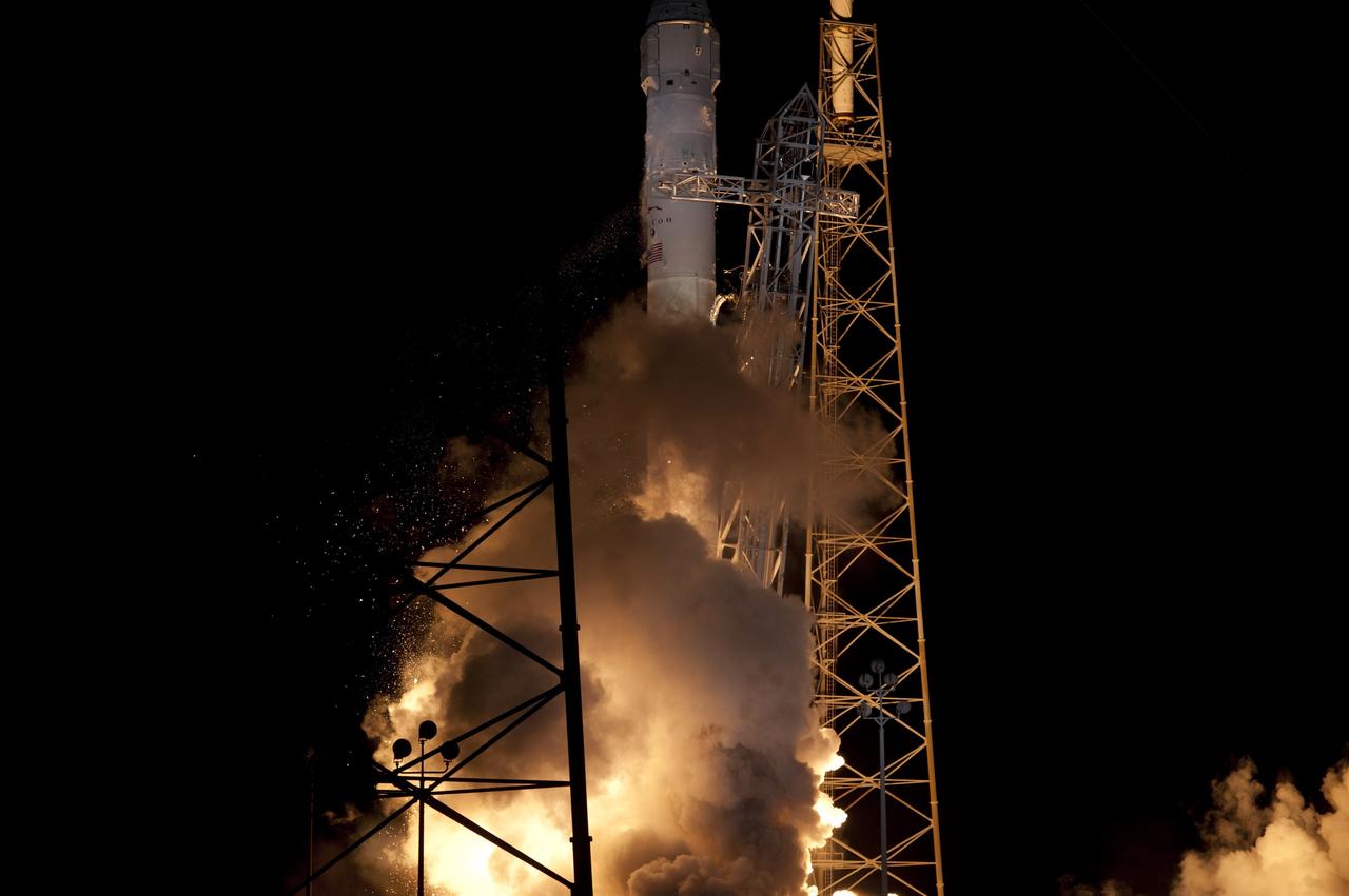 CAPE CANAVERAL, Fla. - Space Launch Complex 40 on Cape Canaveral Air Force Station in Florida comes alive as the Merlin engines ignite under the Falcon 9 rocket carrying a Dragon capsule to orbit. Liftoff was at 8:35 p.m. EDT. Space Exploration Technologies Corp., or SpaceX, built both the rocket and capsule for NASA's first Commercial Resupply Services, or CRS-1, mission to the International Space Station.      SpaceX CRS-1 is an important step toward making America’s microgravity research program self-sufficient by providing a way to deliver and return significant amounts of cargo, including science experiments, to and from the orbiting laboratory. NASA has contracted for 12 commercial resupply flights from SpaceX and eight from the Orbital Sciences Corp. For more information, visit http://www.nasa.gov/mission_pages/station/living/launch/index.html  Photo credit: NASA/Rusty Backer