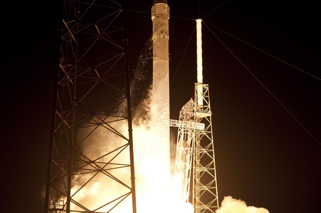 CAPE CANAVERAL, Fla. - Space Launch Complex 40 on Cape Canaveral Air Force Station in Florida comes alive as the Merlin engines ignite under the Falcon 9 rocket carrying a Dragon capsule to orbit. Liftoff was at 8:35 p.m. EDT. Space Exploration Technologies Corp., or SpaceX, built both the rocket and capsule for NASA's first Commercial Resupply Services, or CRS-1, mission to the International Space Station.      SpaceX CRS-1 is an important step toward making America’s microgravity research program self-sufficient by providing a way to deliver and return significant amounts of cargo, including science experiments, to and from the orbiting laboratory. NASA has contracted for 12 commercial resupply flights from SpaceX and eight from the Orbital Sciences Corp. For more information, visit http://www.nasa.gov/mission_pages/station/living/launch/index.html  Photo credit: NASA/Rusty Backer