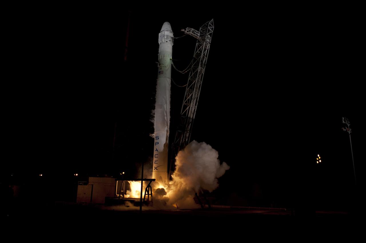 CAPE CANAVERAL, Fla. - Space Launch Complex 40 on Cape Canaveral Air Force Station in Florida comes alive as the Merlin engines ignite under the Falcon 9 rocket carrying a Dragon capsule to orbit. Liftoff was at 8:35 p.m. EDT. Space Exploration Technologies Corp., or SpaceX, built both the rocket and capsule for NASA's first Commercial Resupply Services, or CRS-1, mission to the International Space Station.      SpaceX CRS-1 is an important step toward making America’s microgravity research program self-sufficient by providing a way to deliver and return significant amounts of cargo, including science experiments, to and from the orbiting laboratory. NASA has contracted for 12 commercial resupply flights from SpaceX and eight from the Orbital Sciences Corp. For more information, visit http://www.nasa.gov/mission_pages/station/living/launch/index.html  Photo credit: NASA/ Rick Wetherington and Tim Powers